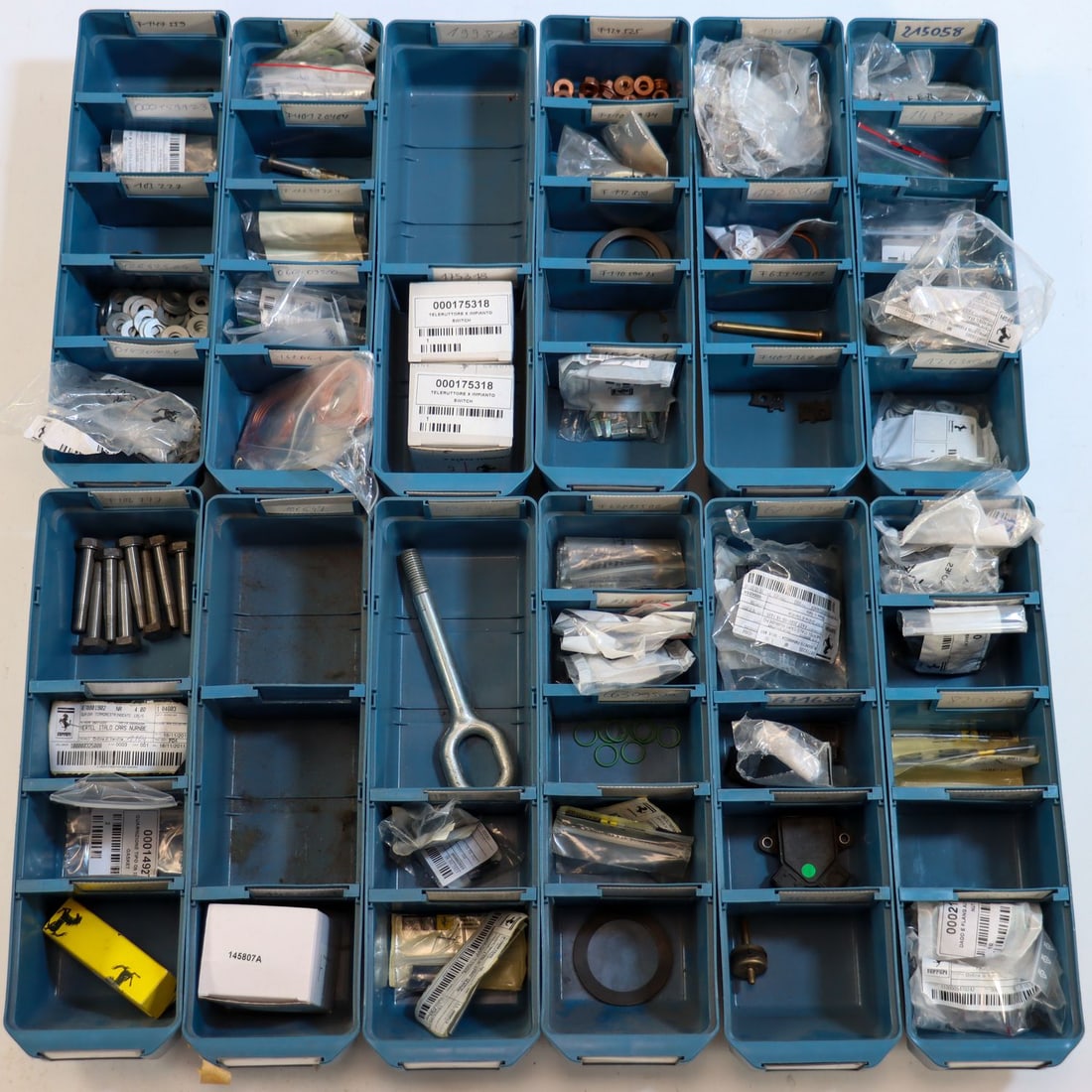 Ferrari Approx. 350-piece spare parts NOS from the stock of: Cross-model for types from the 80s to 2010s, including type F40, F50, Testarossa etc., part numbers: 211641, 210971, 216085, 215058, 155980, 67163300, 63345300, 190151, 124525, 112800, 62885500, 17531