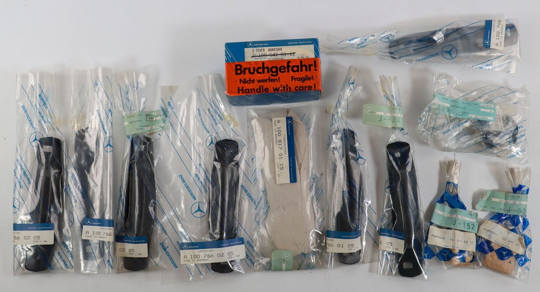 Mercedes-Benz 11-piece Spare Parts NOS for Type 600 W100: Part numbers: 100.542.01.11, 100.817.01.15, 2x 100.811.00.72, 100.811.01.27, 3x 100.766.01.05, 4x 100.766.02.05, each in original packaging