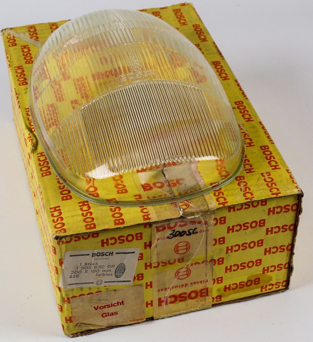 Mercedes-Benz Headlight lens for Type 300SL: A0008265390, brand new, with original packaging