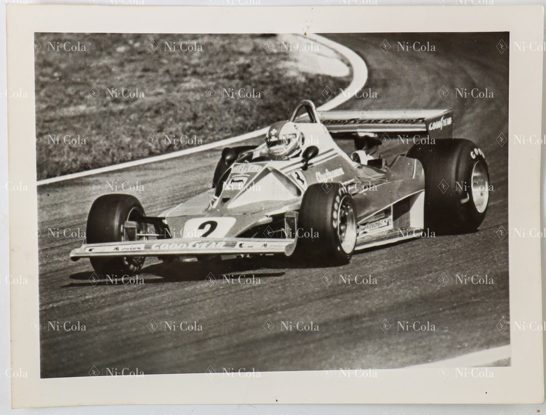 Ferrari Original B/W Press Photo from the Grand Prix Zandvo: Clay Regazzoni in the cockpit of the legendary Ferrari 312T2 on his way to 2nd place (including fastest race lap). Dimensions: 18 x 24 cm.