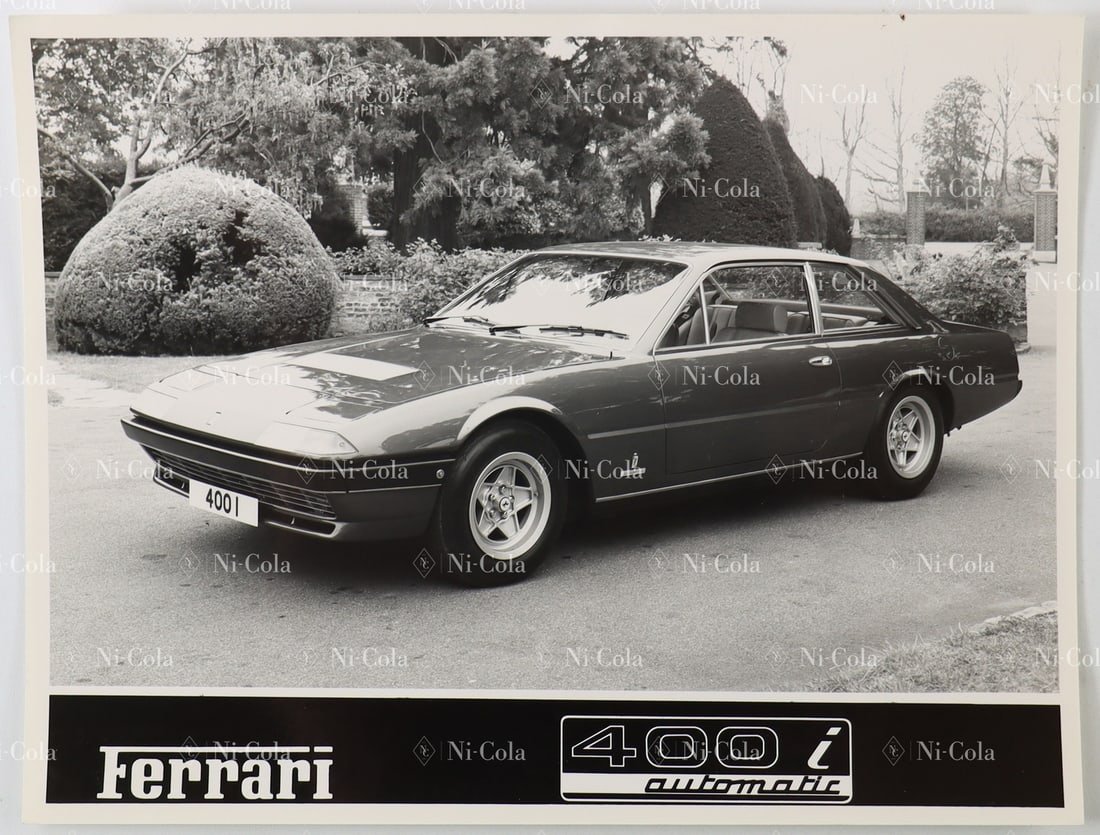 Ferrari Original B/W Press Photo: Ferrari 400i Automatic.: Factory official studio/vehicle shot of the elegant V12 classic with integrated type logo inlay. Dimensions: 16.5 x 21.5 cm.