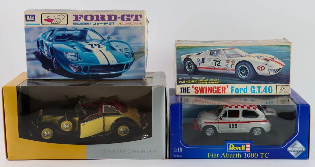 Modellauto 4-piece: Audi Tradition Horch 930V Cabriolet (1939), Revell Metal Fiat Abarth 1000 TC, both in OVP and in scale 1:18, model kit Ford GT, scale: 1:24, empty packaging 'The Swinger Ford G.T. 40'