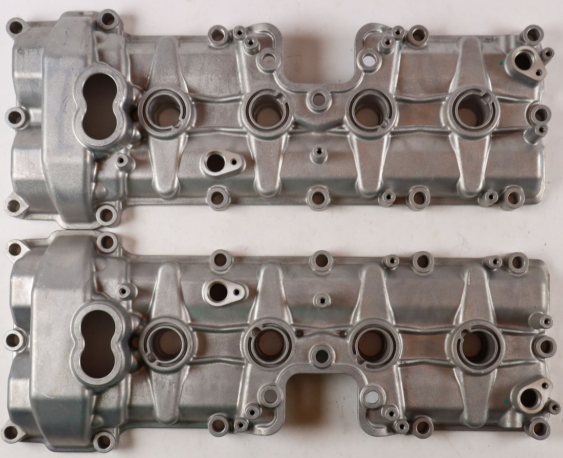 Ferrari Set of Valve Covers for Type 458 Italia: Part numbers: 250892 and 250893, left and right side, unpainted