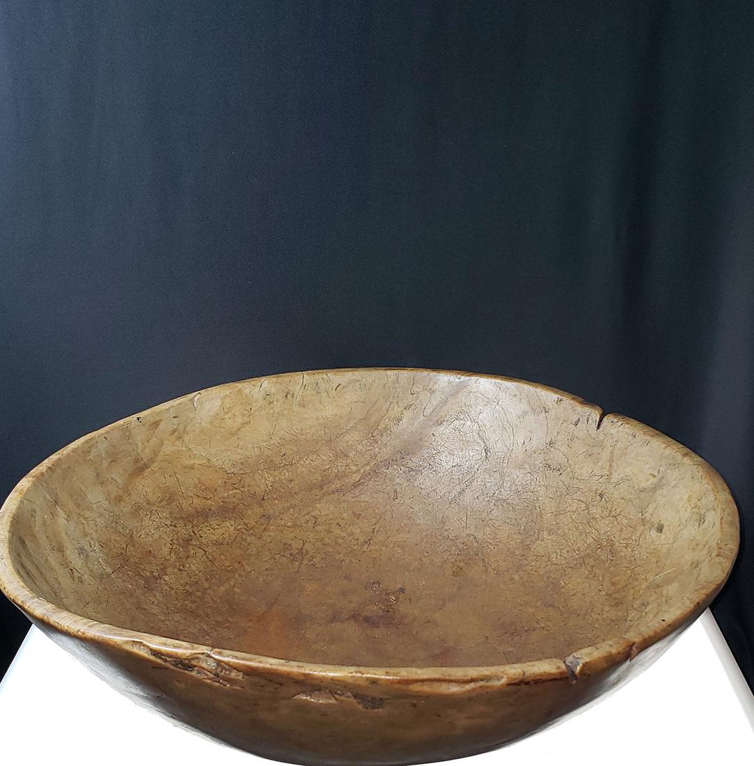 A fine Burled Wood Bowl possibly native: A fine Burled Wood Bowl Measures 16 1/2" x 13" x 5 1/2".Purchased from the Estate of Robert Allen.