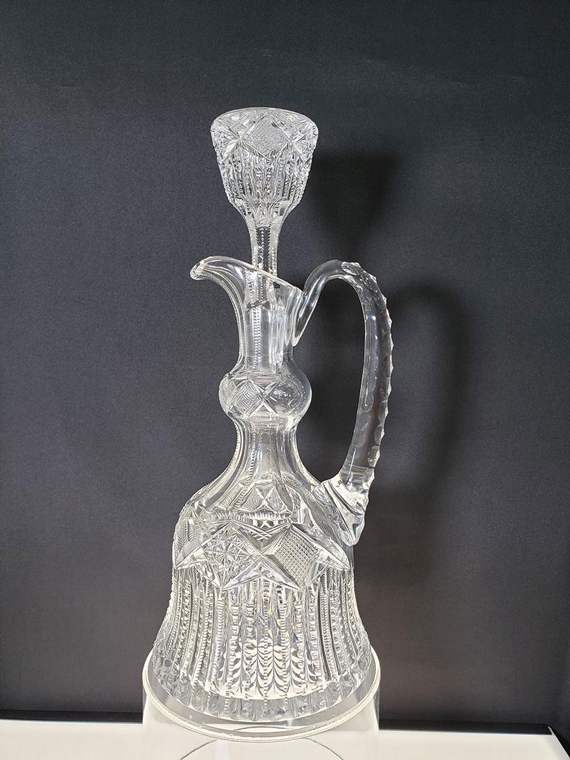 American Brilliant Pd cut glass decanter Pitkin & Brook: American Brilliant Pd cut glass decanter with pattern stopper Pitkin & Brooks. Measures 13.5" Tall.