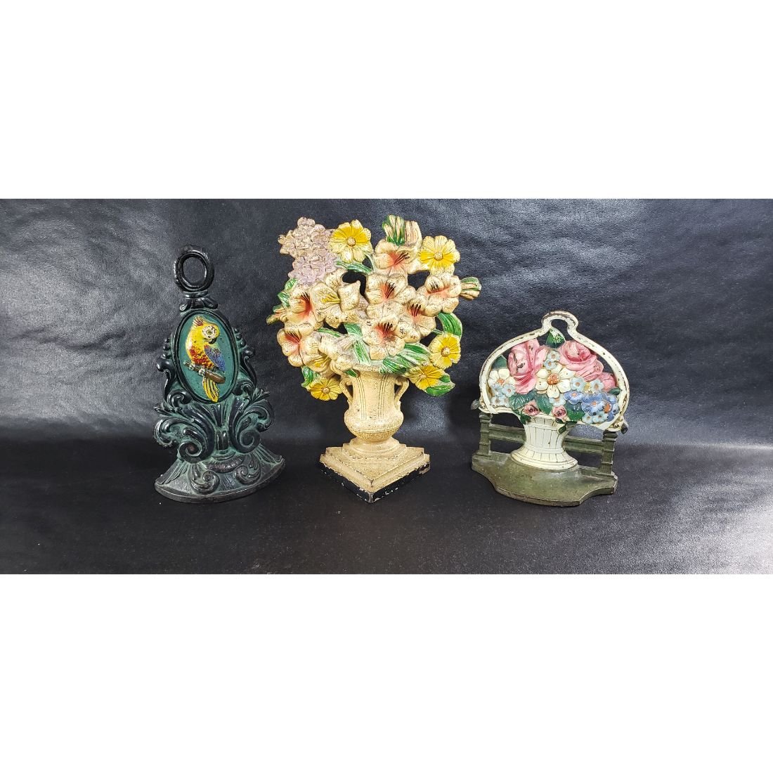 Lot Of 3 Antique Painted Cast Iron Door Stops: Lot Of 3 Antique Painted Cast Iron Door Stops. Measures 10.5, 9.5" and 7".