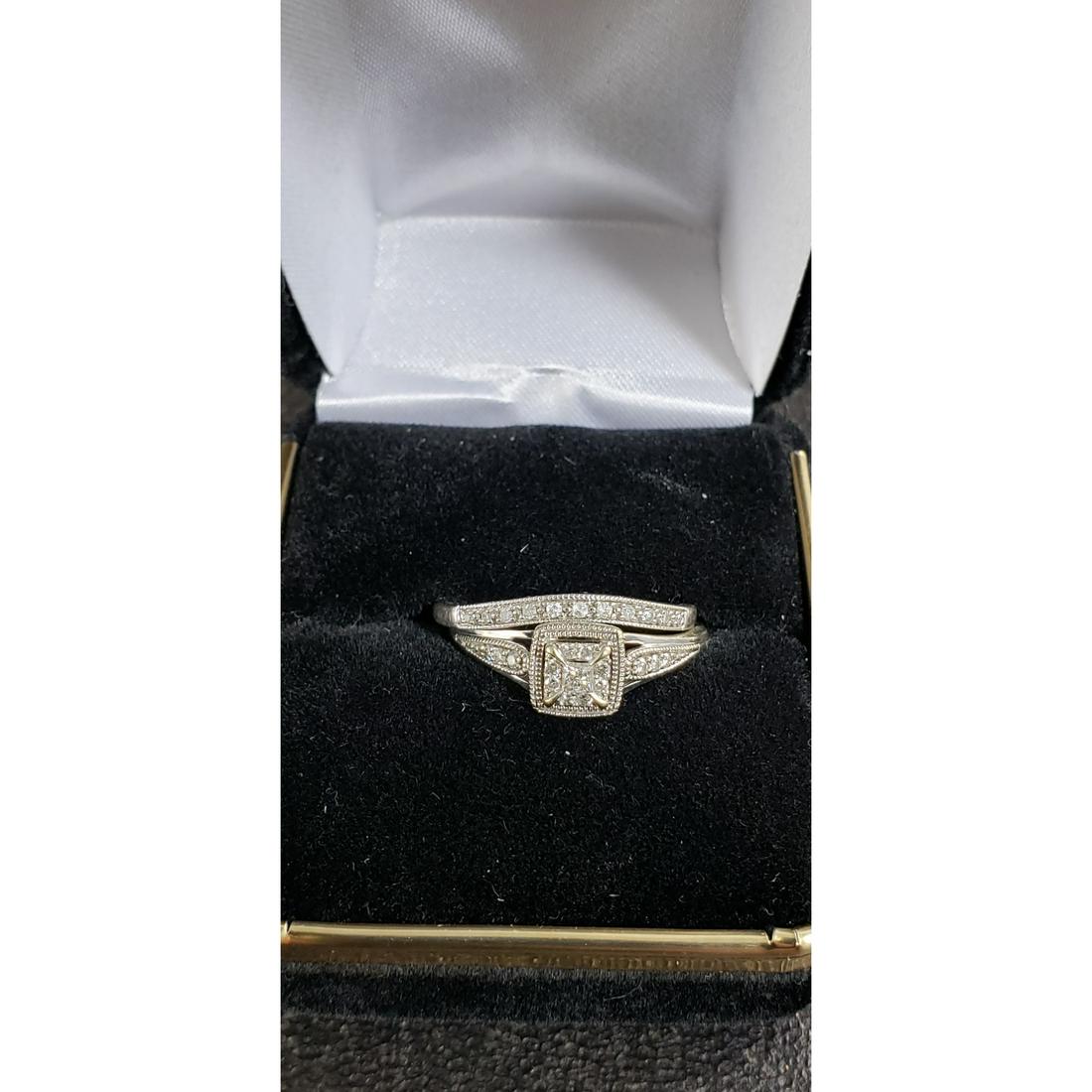 10 K Gold with Diamond Wedding Rings 3 G 1/2 TDW: 10 K Gold with Diamonds Wedding Rings 3 G Size 8.5 1/2 TDW ( RETAIL WAS 1799.00 )