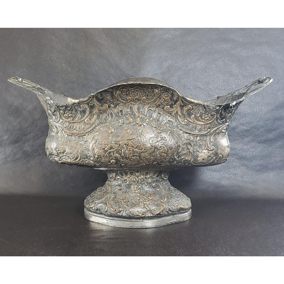 Antique Center Piece Bowl With Cherubs Cross London: Antique Center Piece Bowl With Cherubs mark "Cross London". Measures 16.5" x 9" x 7.5"