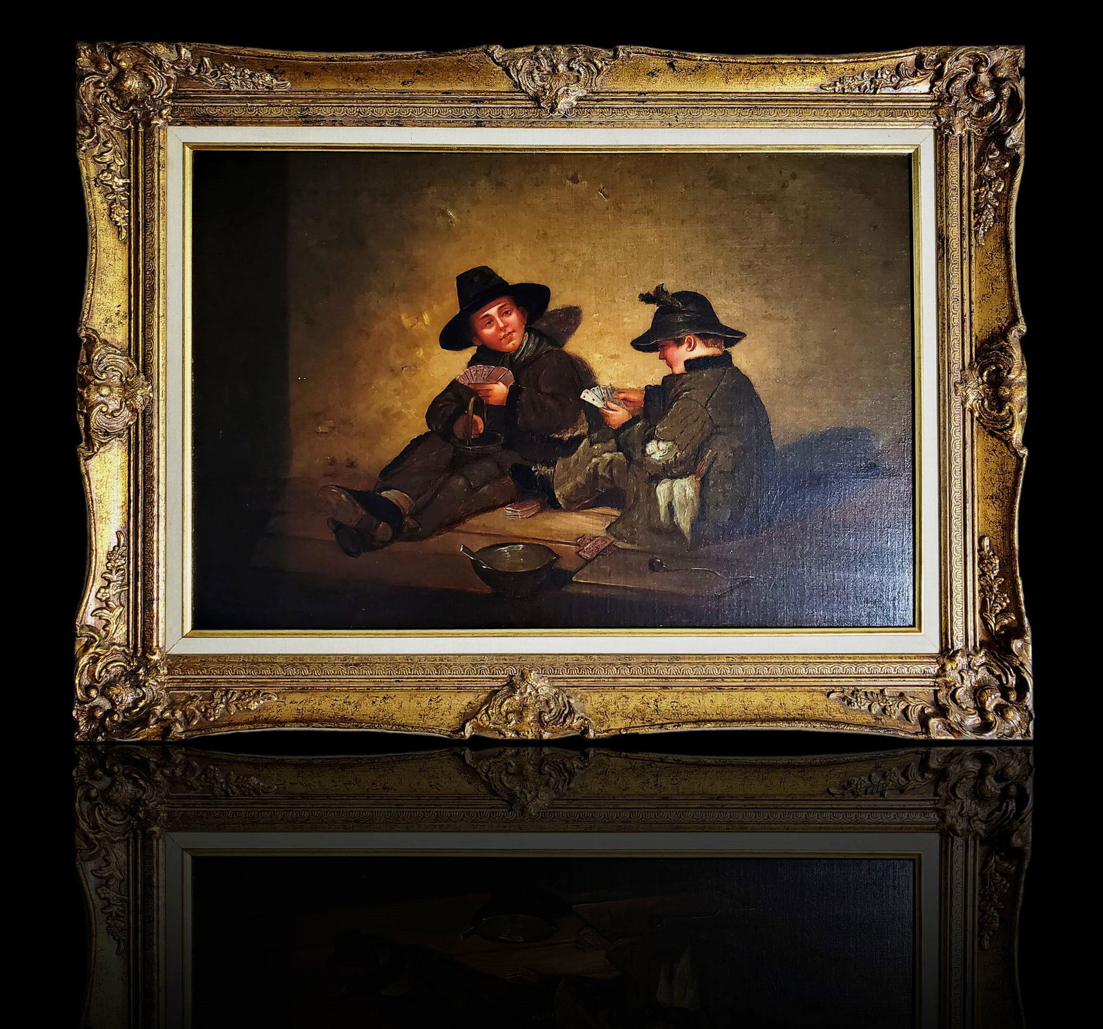 19th Century O/C two boys playing cards signed: 19th Century O/C two boys playing cards signed. Frame measures 27 1/4" x 37.5"