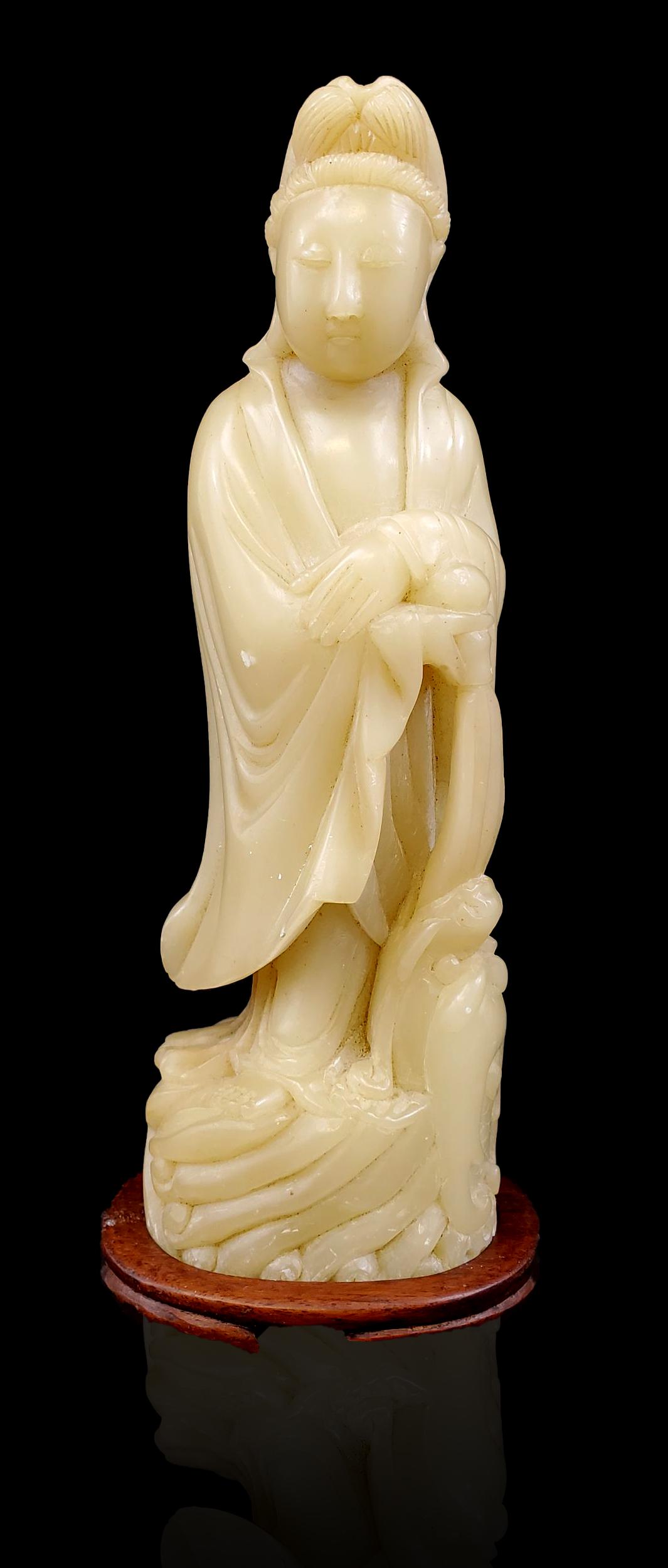 A Chinese Soapstone Figure Kwan Yin 19th Century: A Chinese Soapstone Figure Kwan Yin 19th Century. Measures 9 1/4"