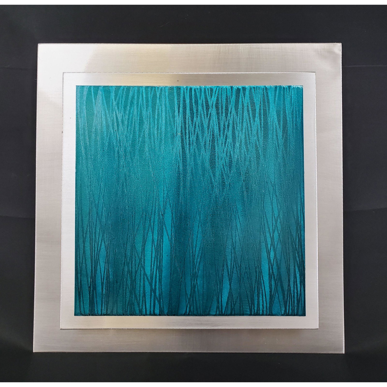 Turquoise and enamel on stainless steel wall sculpture: Turquoise and enamel on stainless steel wall sculpture. Measures 14" x 14"