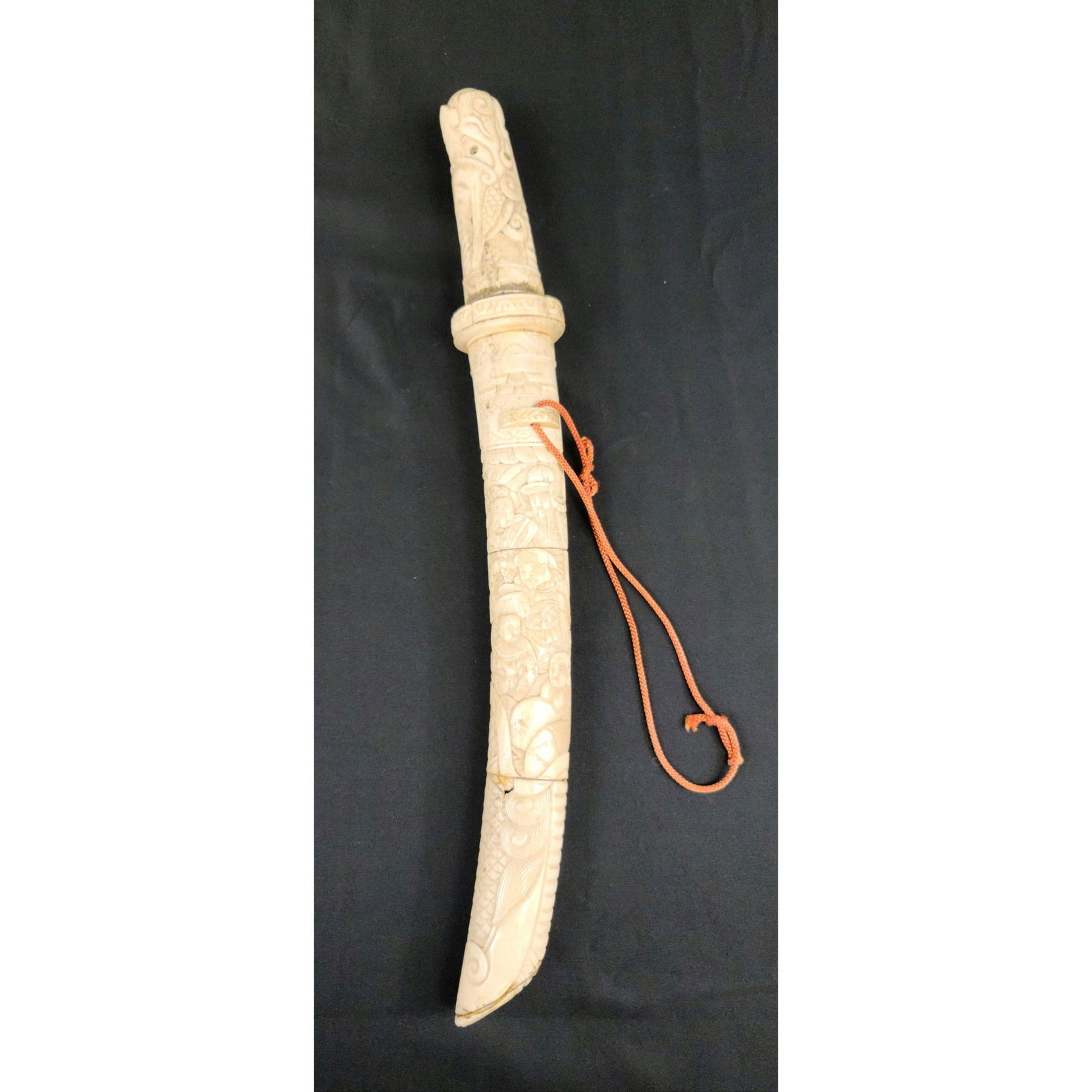 Antique Japanese Short Sword Hand Carved Bone: Antique Japanese Short Sword Hand Carved Bone measures 18" overall 10" blade