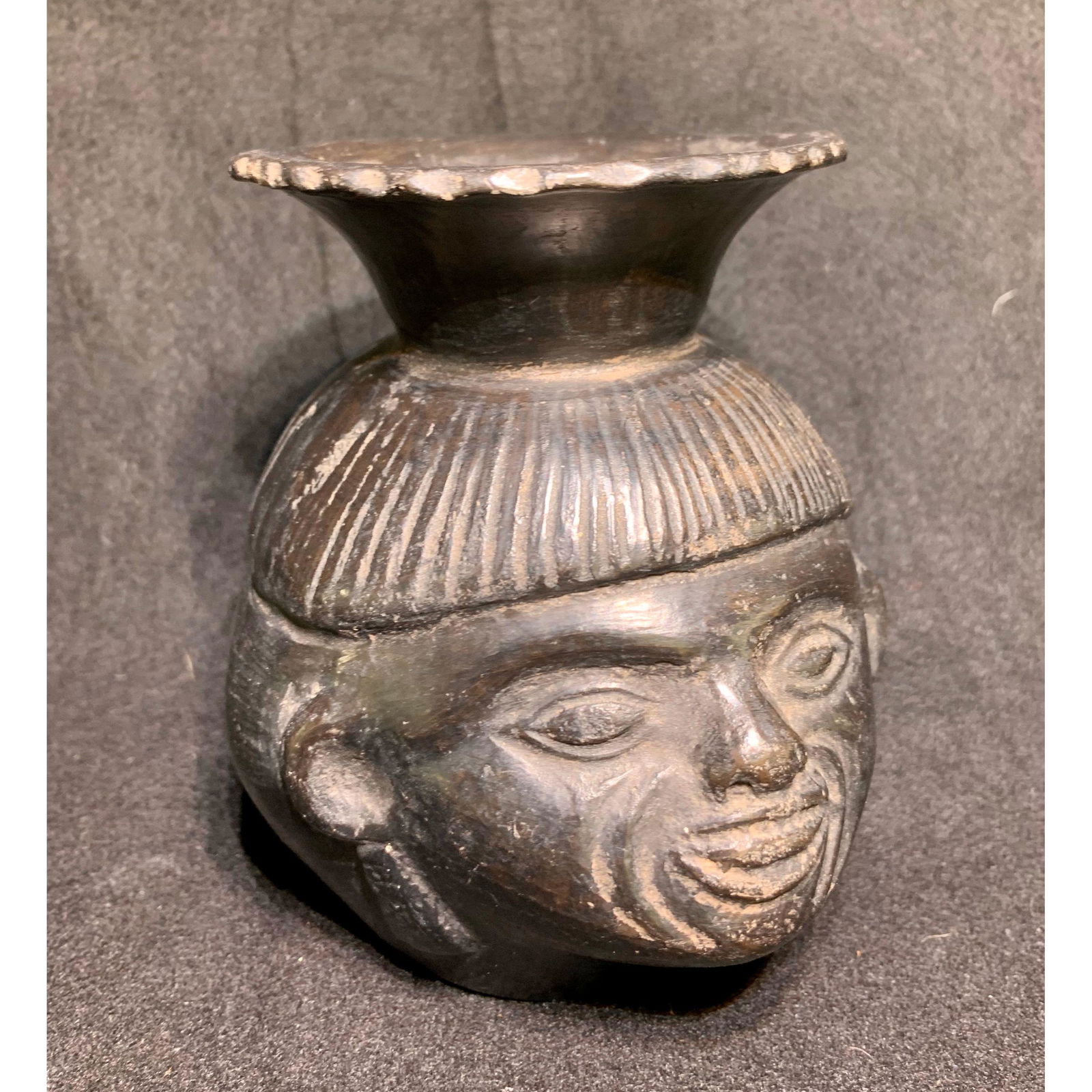 An unusual, unsigned blackware face pot with signatures (1 of 17)