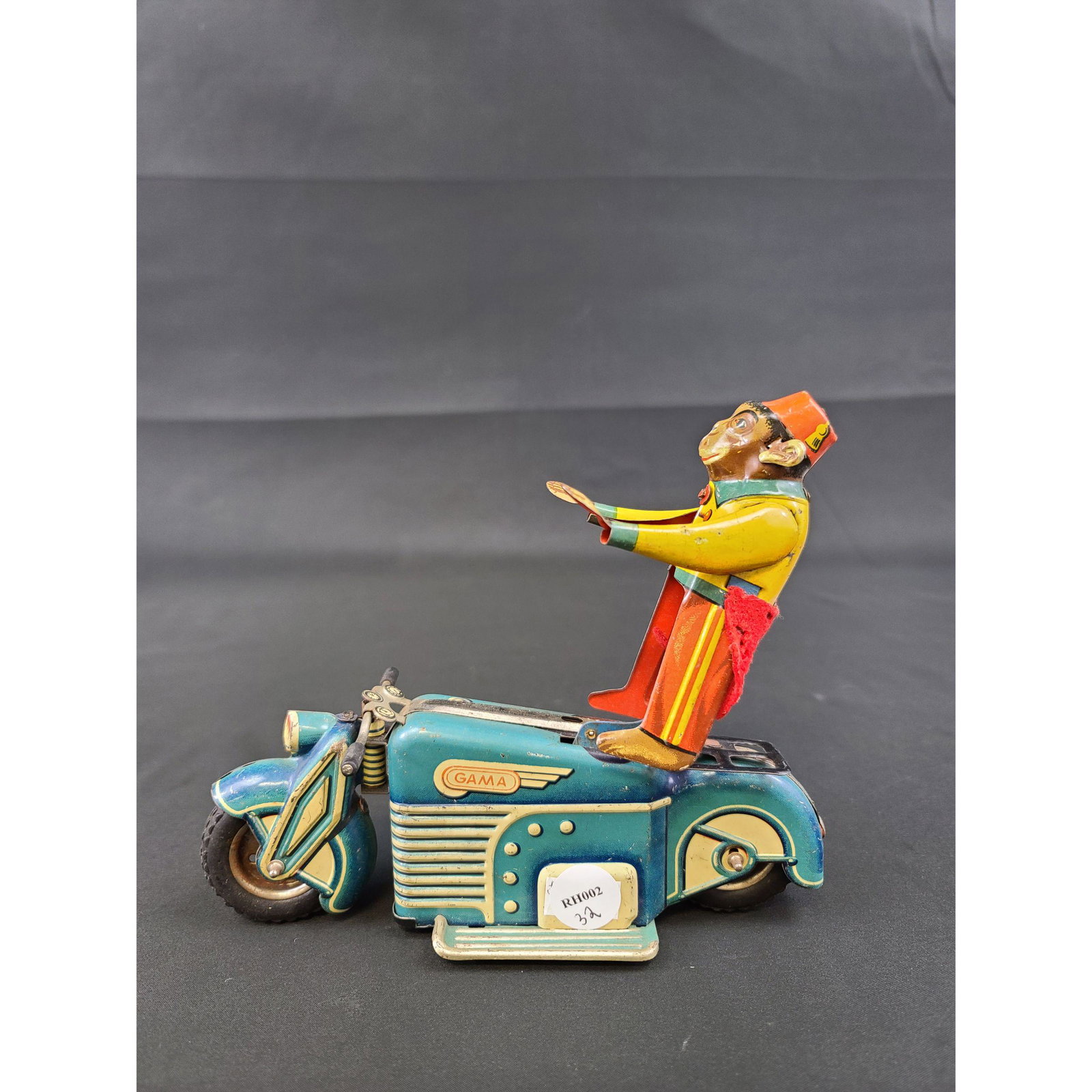 Germany Wind Up Tin Toy Monkey On Motorcycle GAMA 125: German Wind Up Tin Toy Monkey On A Motorcycle 1955 US Zone GAMA 125. Measures 7" x 6"