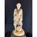 Antique carved man holding lantern