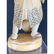 Antique carved man holding lantern - 9