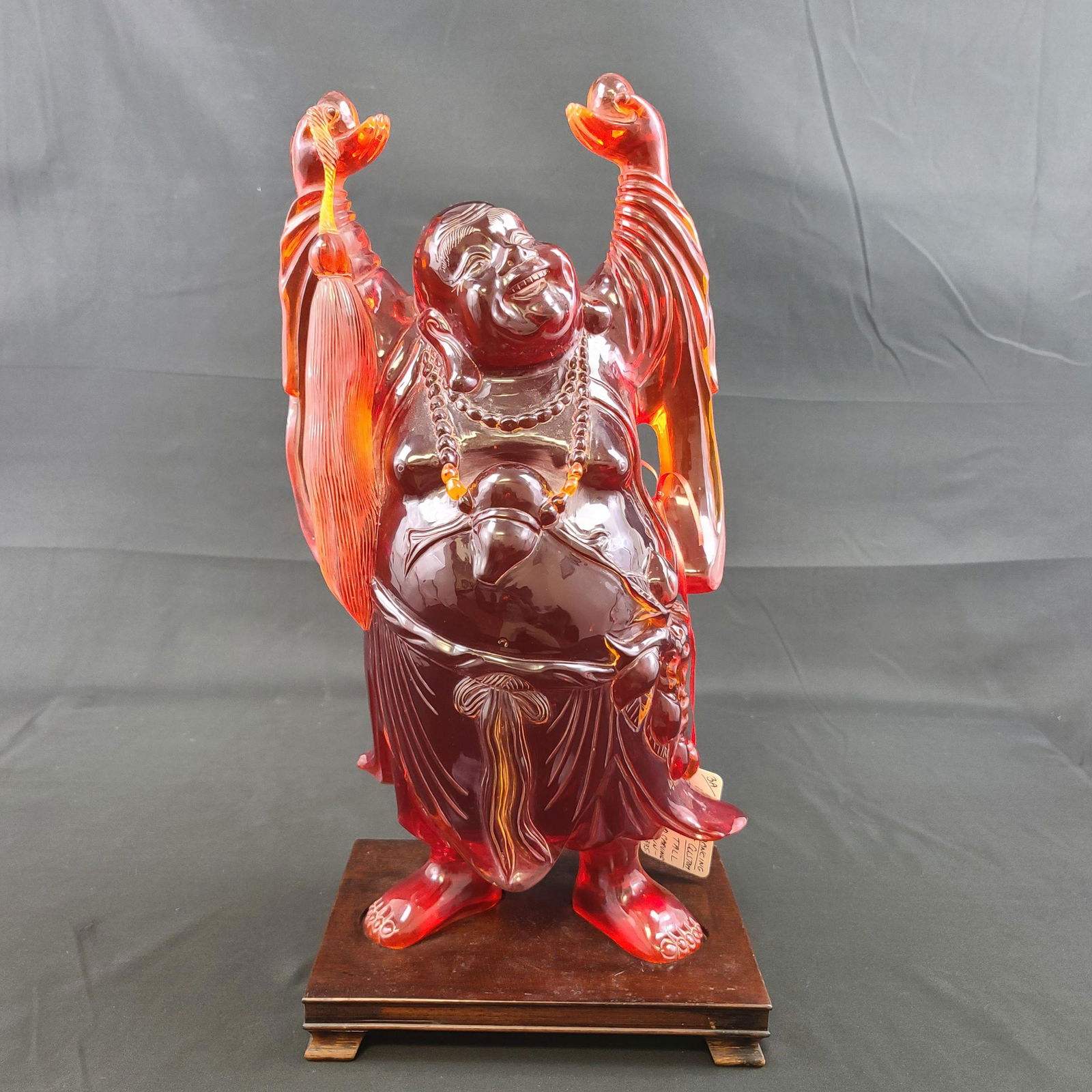 A Large Chinese Amber Style Buddha On Wood Stand (1 of 17)