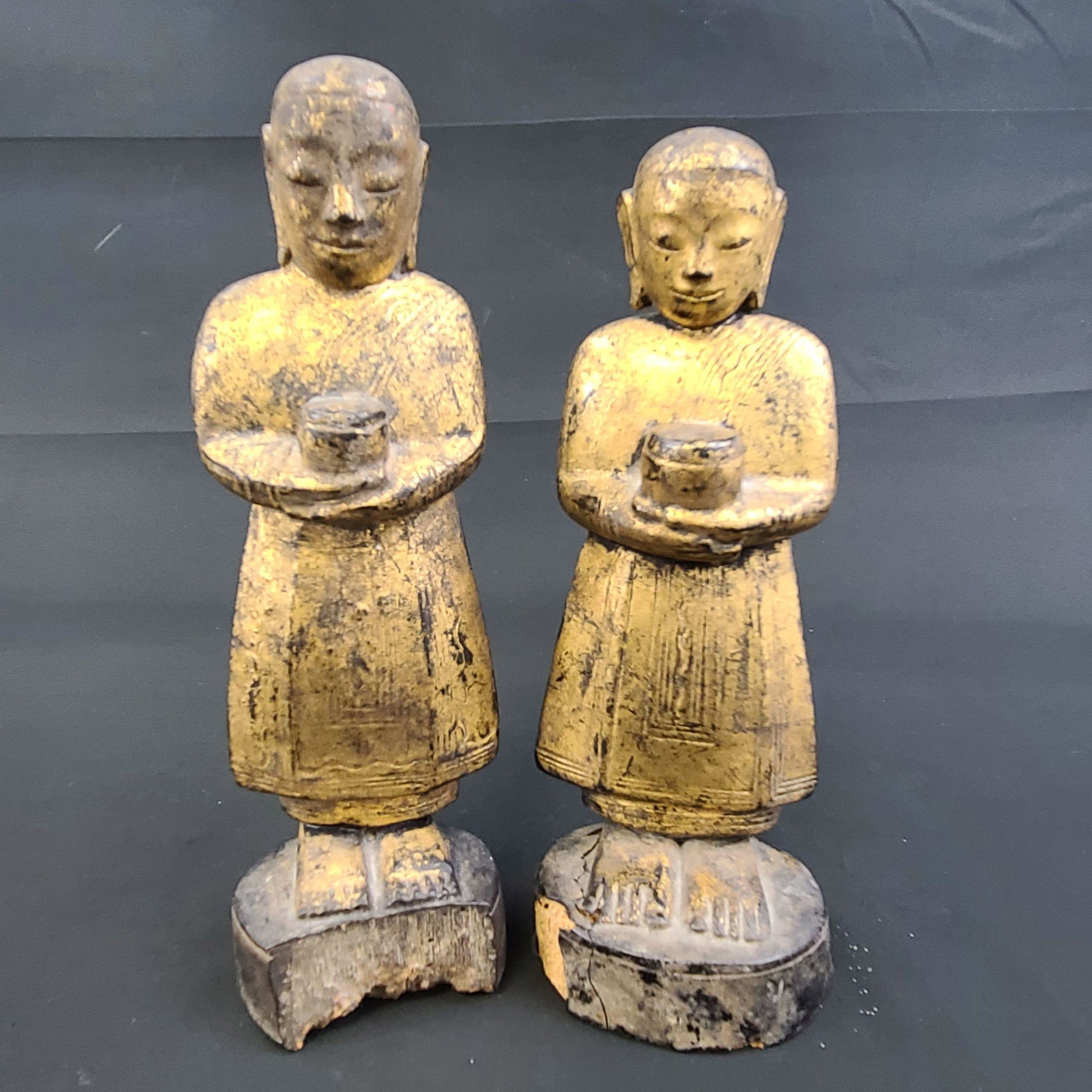 Pair Of Antique Gilt Painted Wooden Thai Figures Signed: pair Of Antique Gilt Painted Wooden Thai Sculptures. Measure 8.5" And 9" Tall. One Signed
