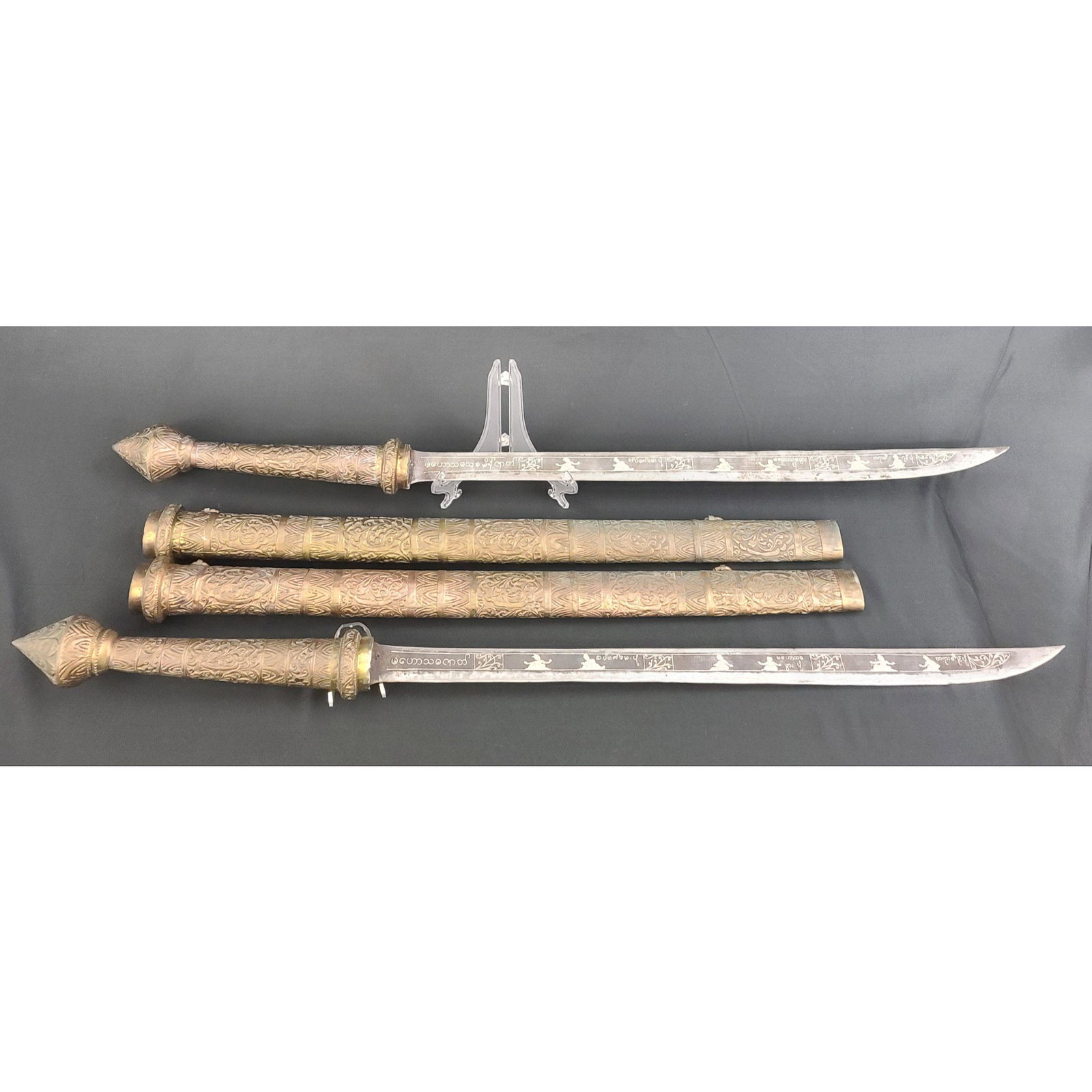 Lot of 2 19th Century Inlaid Burmese Swords: Lot of 2 19th Century Inlaid Burmese Swords. Measures 39"overall, with the blade measuring 26 1/4".