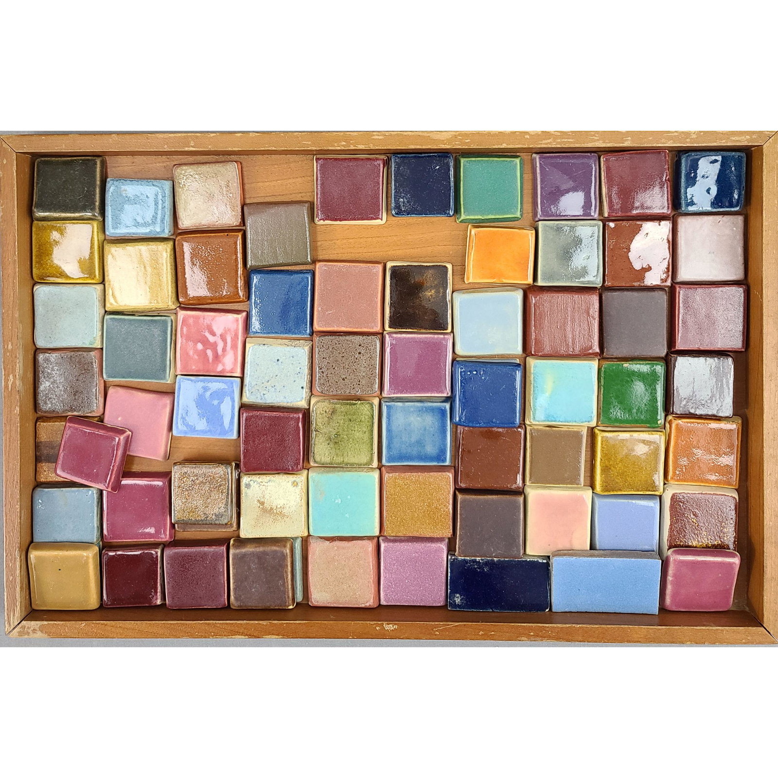 69 University Of North Dakota School Of Mines Tiles: Lot Of 69 University Of North Dakota School Of Mines Tiles, Trial Glazes Approx. 1 1/4" Square. A wide Variety OF Colors And Mostly all Are Marked.