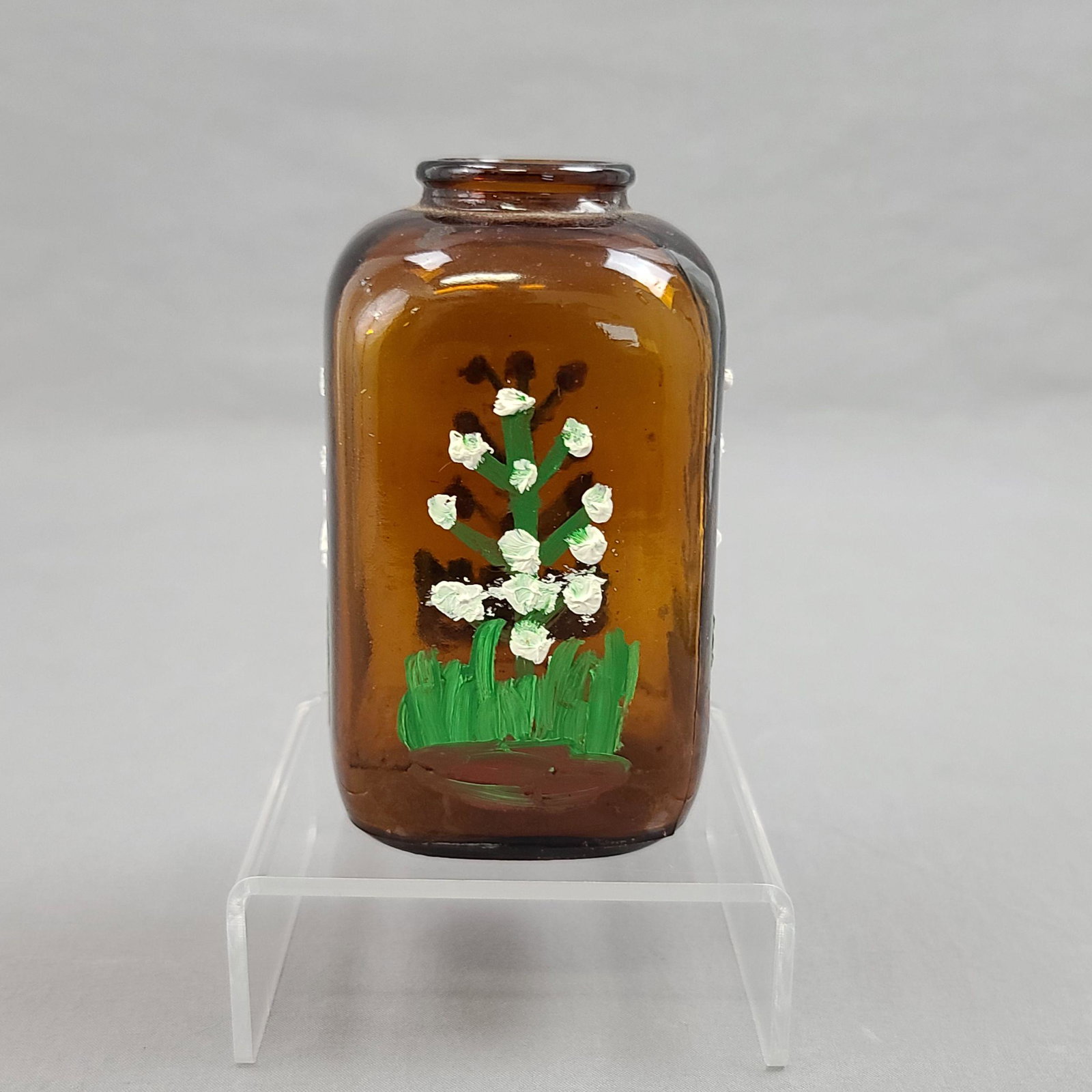 Clementine Hunter (American/Louisiana, 1886-1988) Paint: Clementine Hunter (American/Louisiana, 1886-1988). BOTTLE measure 4.5" X 2 1/4. From A Scott City Mo Estate. WE also Have Several of Frankie Hunter Paintings From this Very Estate And A Painted Bottle