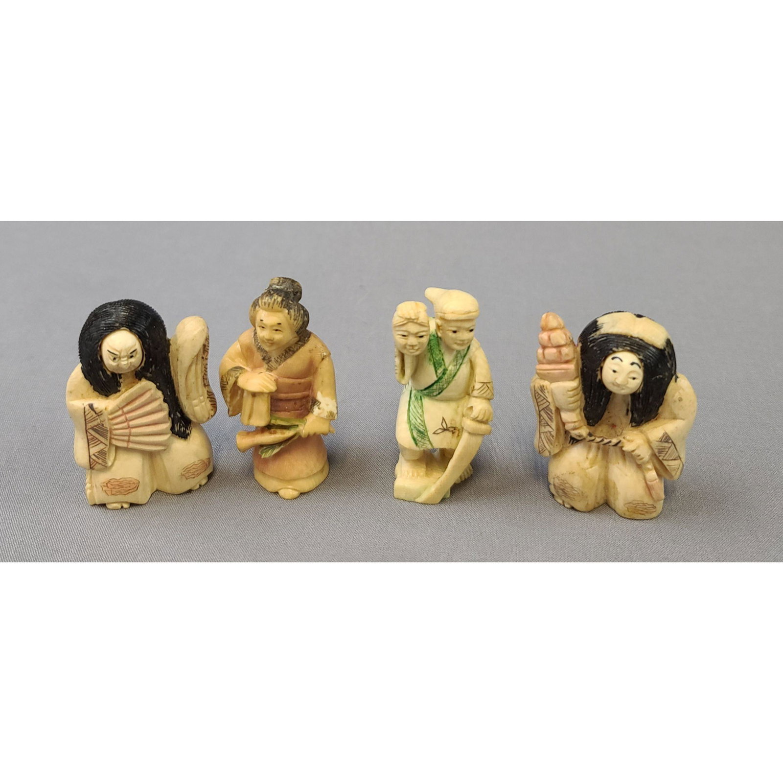 4 Antique Japanese Carved Figures Signed Meiji Period: 4 Antique Japanese Carved Figures Signed Meiji Period, various sizes.