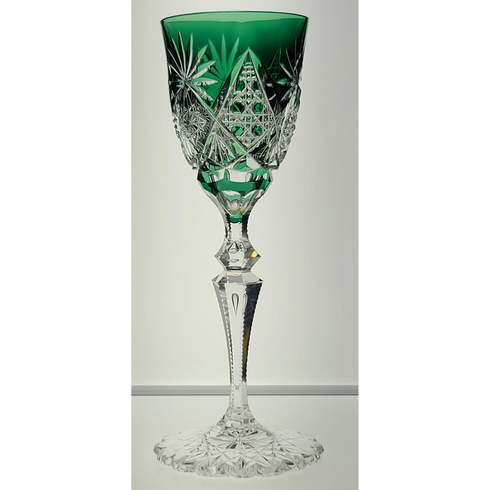 ABP Cut Glass Tall Wine stem, Turquoise Green Color: ABP Cut Glass Tall Wine stem, Turquoise Green color cut to clear, fancy stem and cut bottom; Could be Val St Lambert or Baccarat. Measure 8.5" Tall