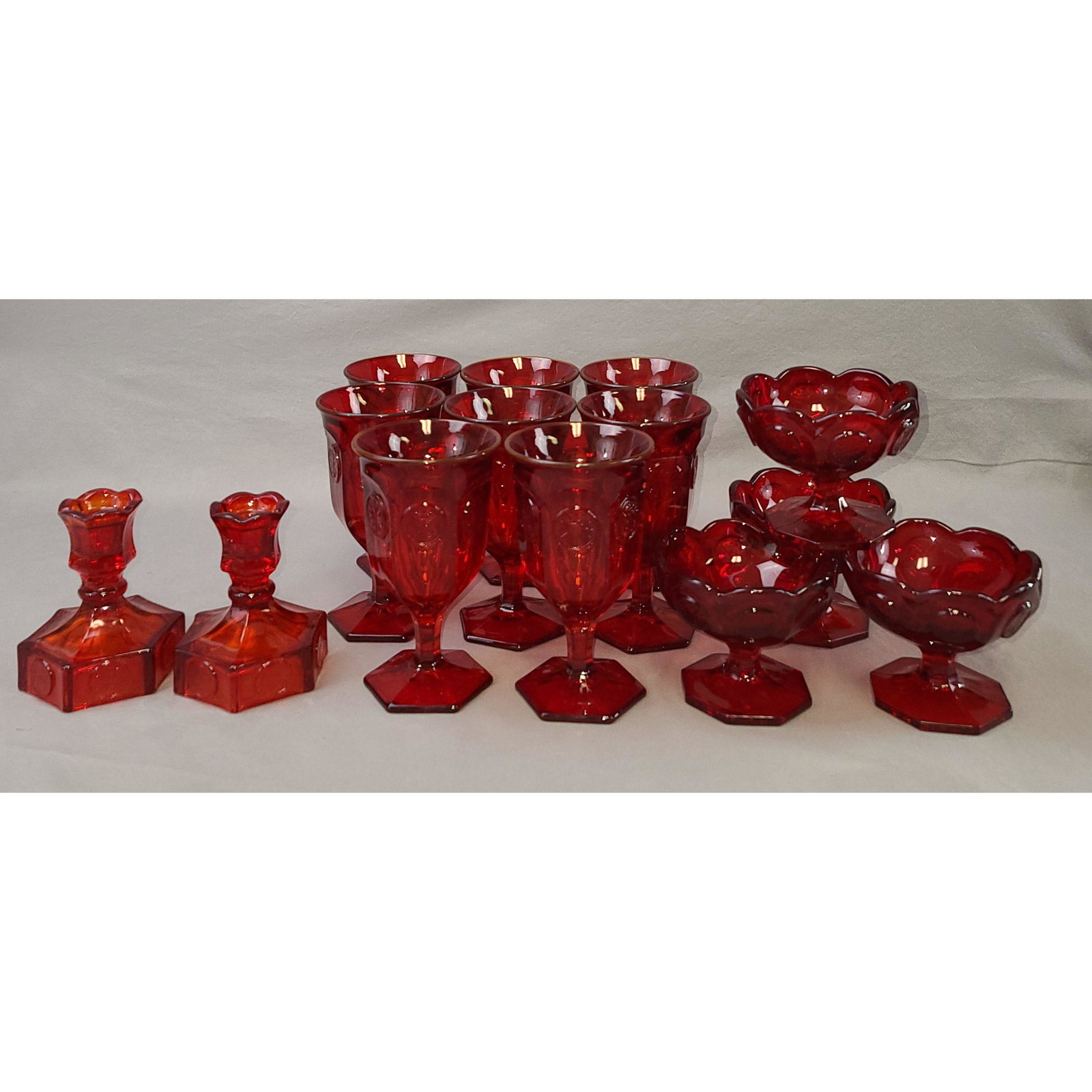 14 Fostoria Ruby Glass Lot Goblets & Candle Holders: Lot Of 14 Ruby Glass Possibly Fostoria. Goblets measure 6.5", dessert Glass 4.5" and Candle Holder 4 3/4" (Looks Amberina)
