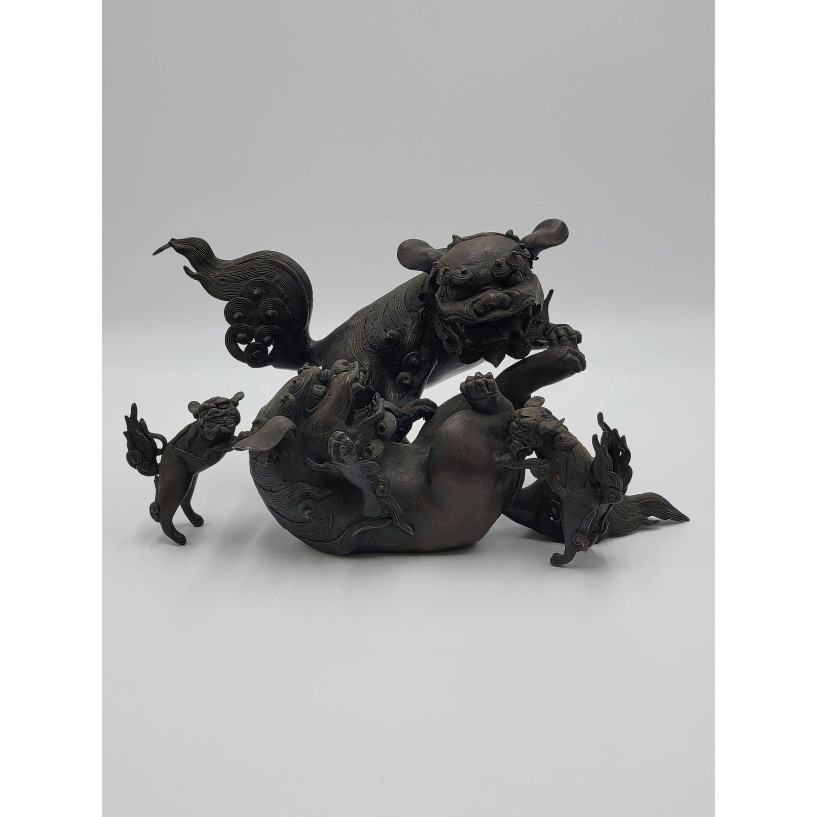 A Grouping of Chinese? bronze Foo Dogs (FAMILY) (1 of 16)