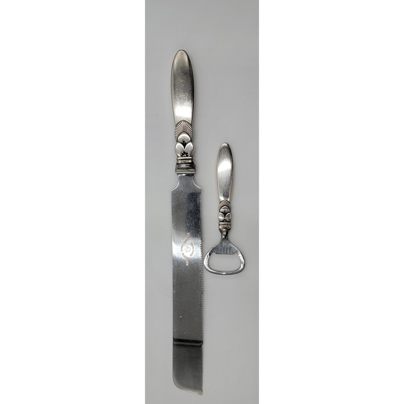 Georg Jensen & Wendel Sterling Silver Knife Opener: Georg Jensen & Wendel Sterling Silver Bred Knife And Bottle Opener.1945-1951. Georg Jensen & Wendel A/S(used exclusively on silver sold through Georg Jensen & Wendel store in Copenhagen, Denmark).