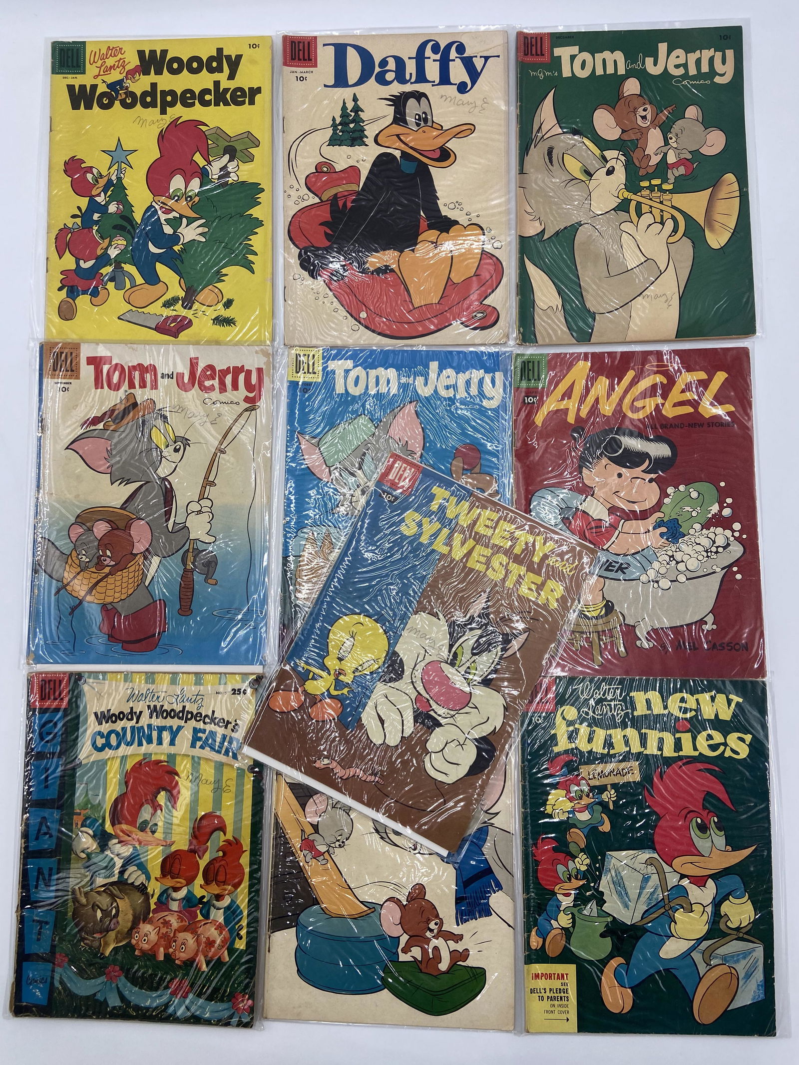 LOT OF 10 VINTAGE DELL COMICS 10 CENTS TOM & JERRY, WOO (1 of 11)