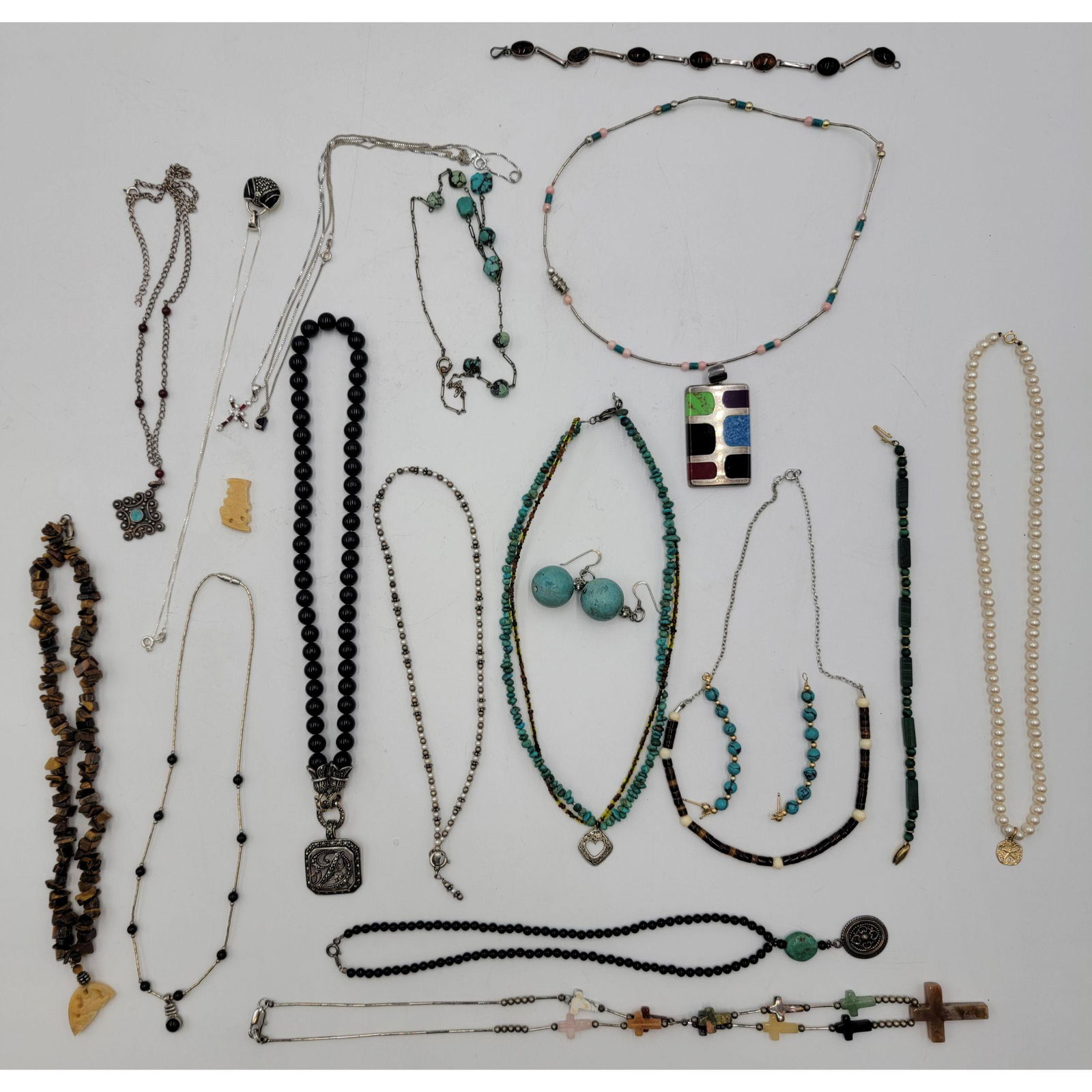 Large Lot Of Sterling Silver And Turquoise Jewelry: Large Lot Of Sterling Silver And Turquoise Jewelry, Tigers Eye Pearl , Amber, Malachite and more.