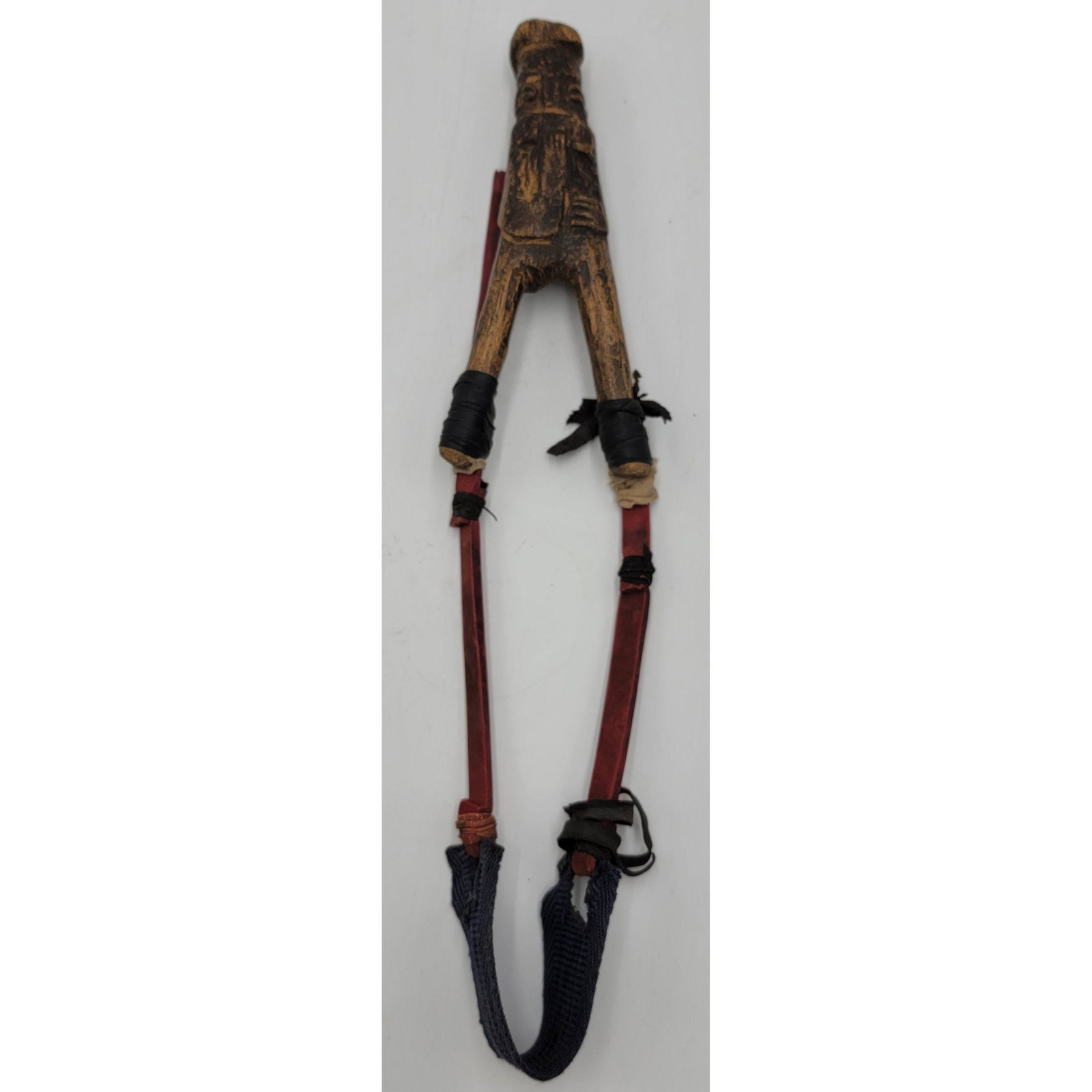 Early, Well-Patinated, Hand-Carved Lobi Slingshot: Early, Well-Patinated, Hand-Carved Lobi Slingshot, A Carved Figure West Africa.