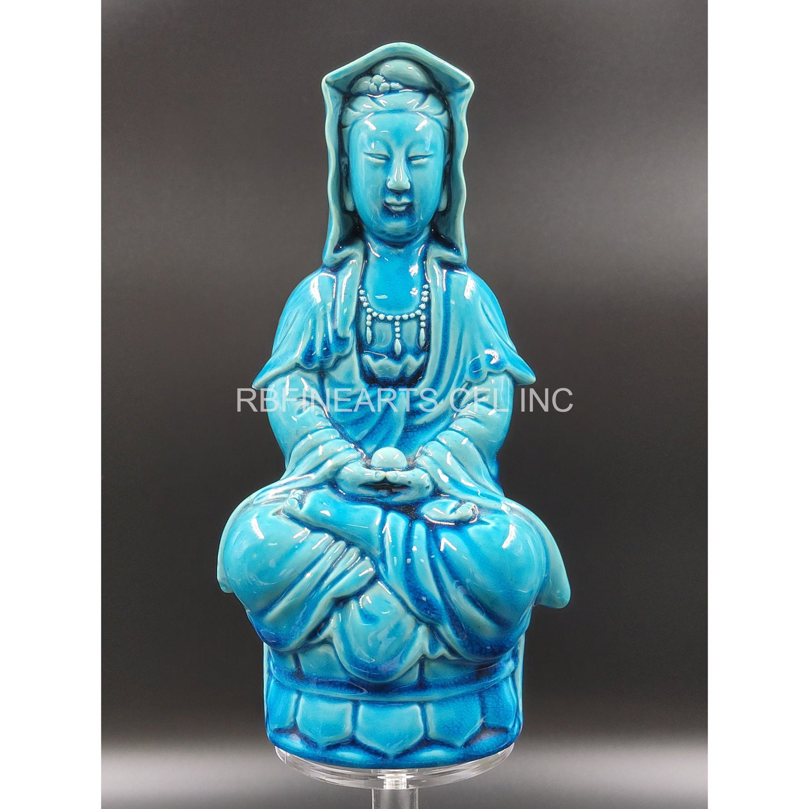 A Chinese Turquoise Seated Kwan Yin Figure 20th C: A Chinese Turquoise Seated Kwan Yin Figure 20th C. Measure 8.5". Please carefully read our terms of sale, shipping information, and request any condition reports or photos prior to placing a bid. Any 