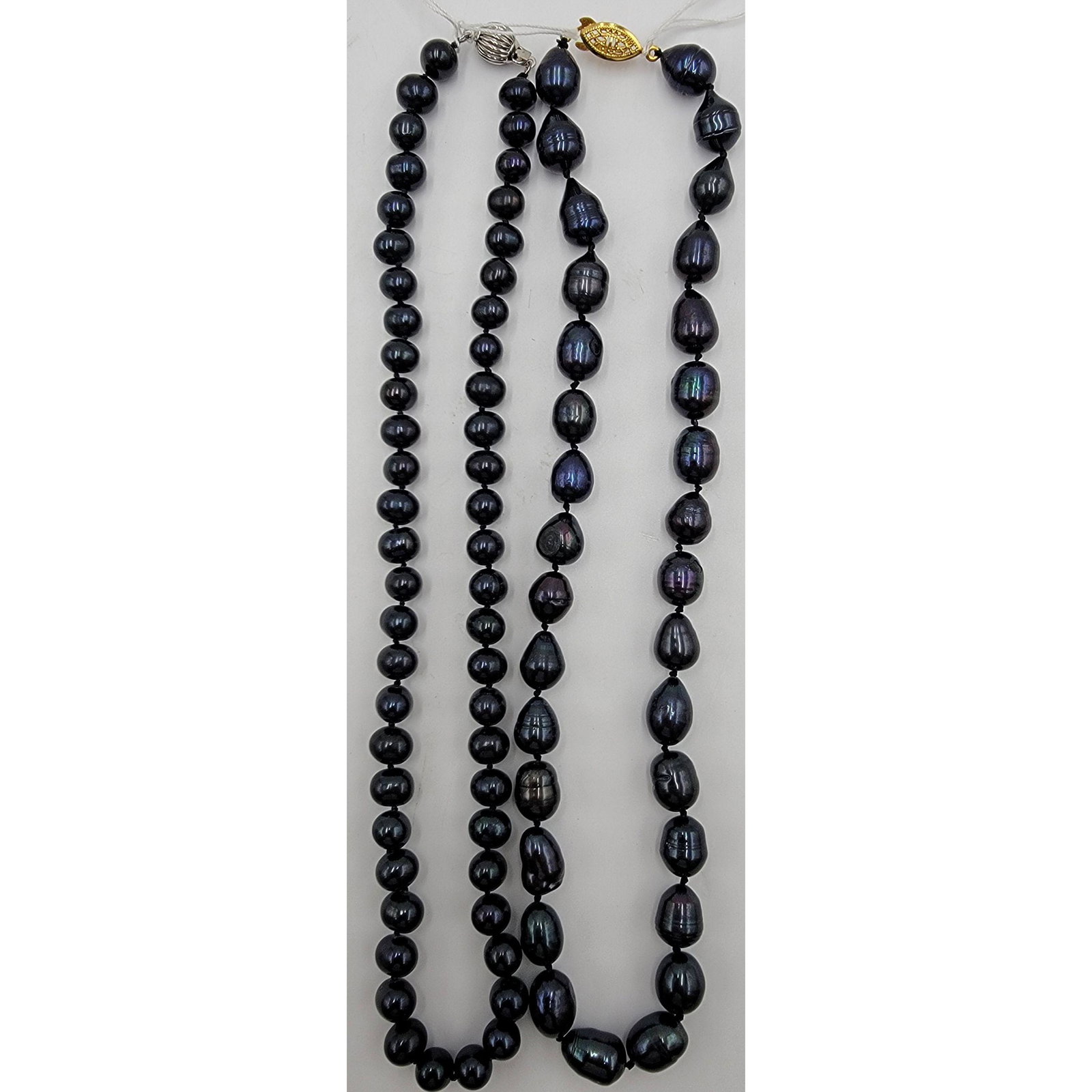 2 Strings Of Natural Tahitian Pearl Necklace Peacock Co: 2 Strings Of Natural Tahitian Pearl Necklace Natural Peacock Color. Measure Approx. 18" Long Each.