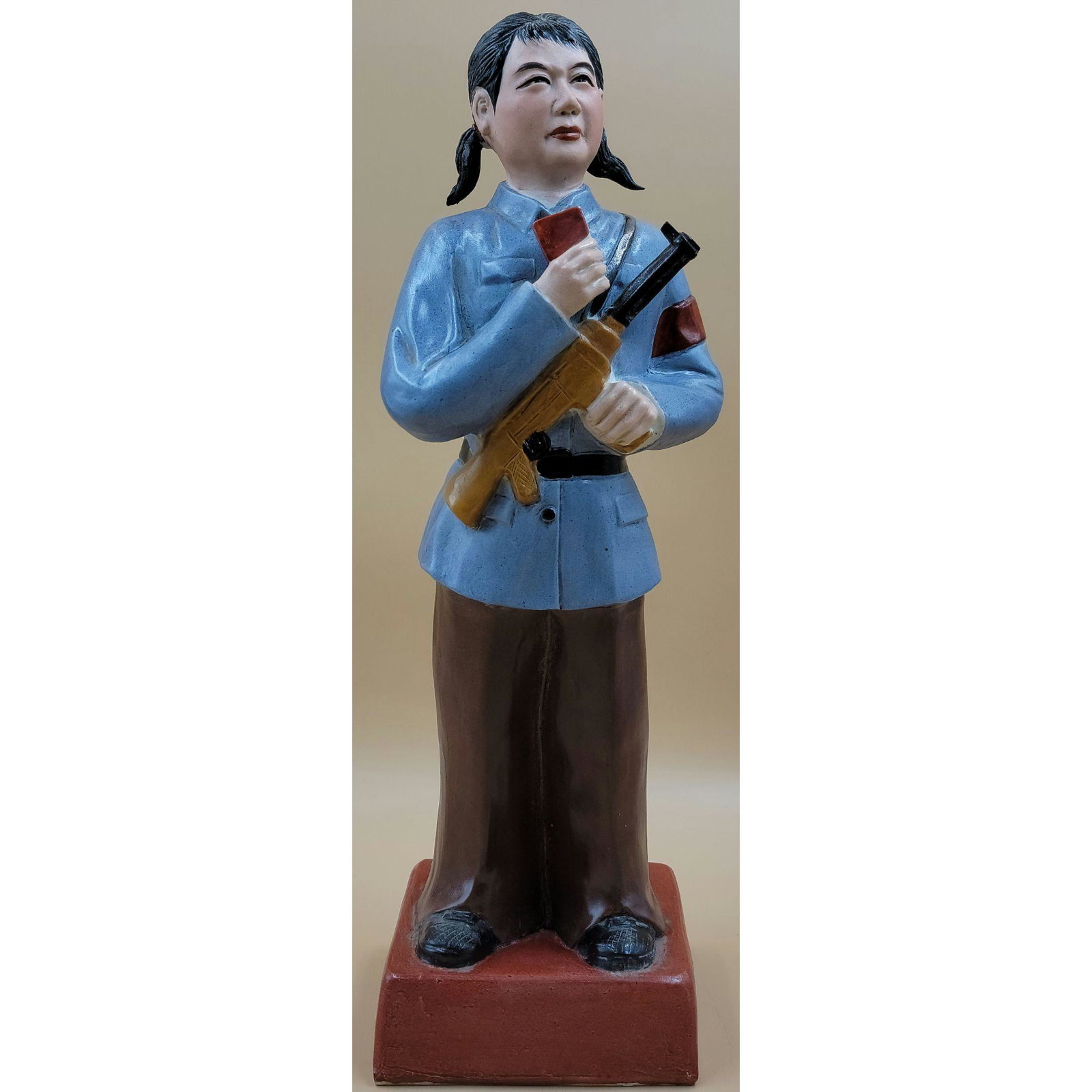 Chinese Cultural Revolution Signed Figure of Red Guard: A large porcelain statue of an armed and determined citizen solider of the Chinese Cultural Revolution, standing about 18". This lot, and more forthcoming are from the monumental central Florida estat