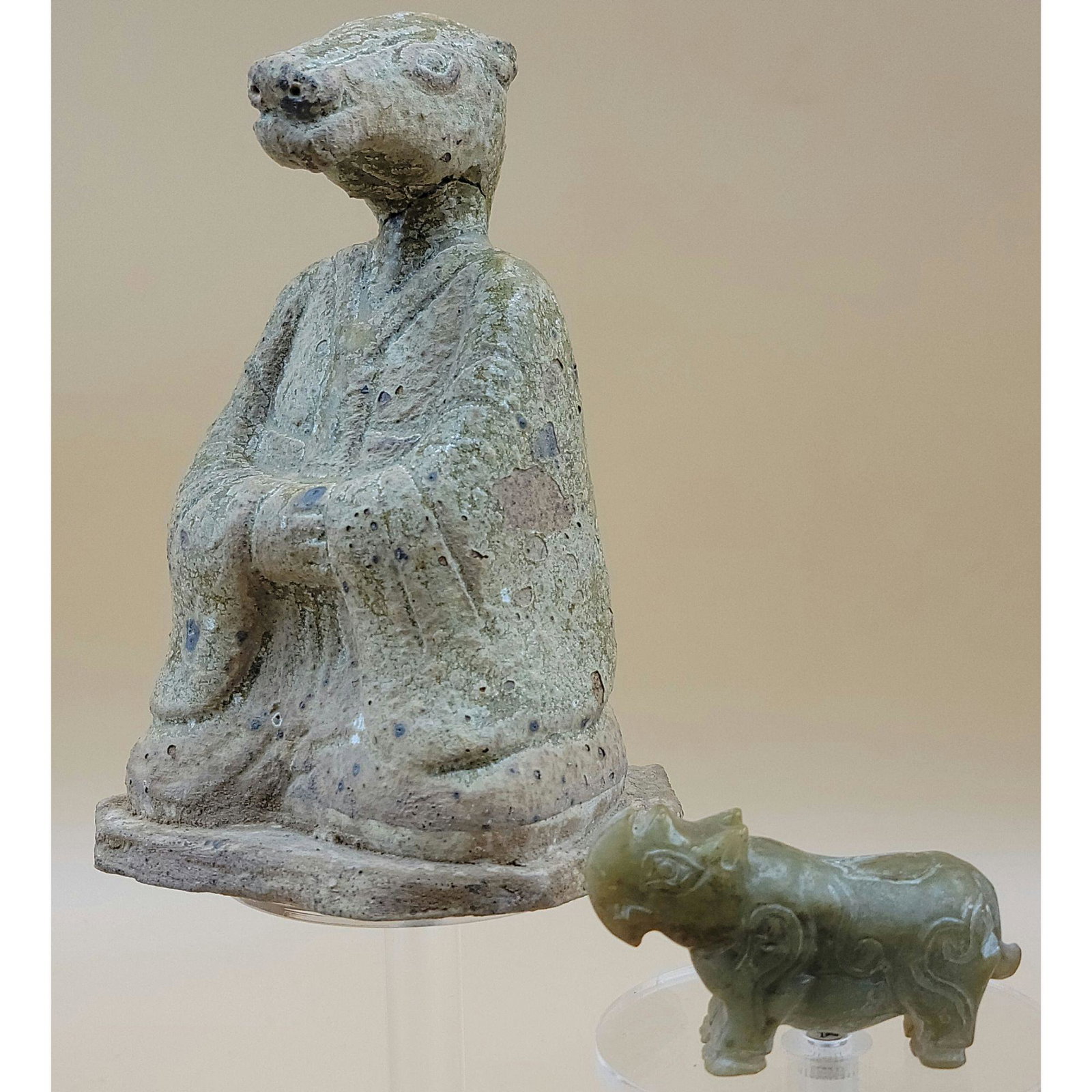 A Han terracotta Zodiac sheep & jade Rhino w Glyphs.: The seated sheep measuring about 6" Tall. This lot, and more forthcoming are from the estate of a true antiquity connoisseur in every sense of the word. This antiquarian truly enjoyed the treasures co