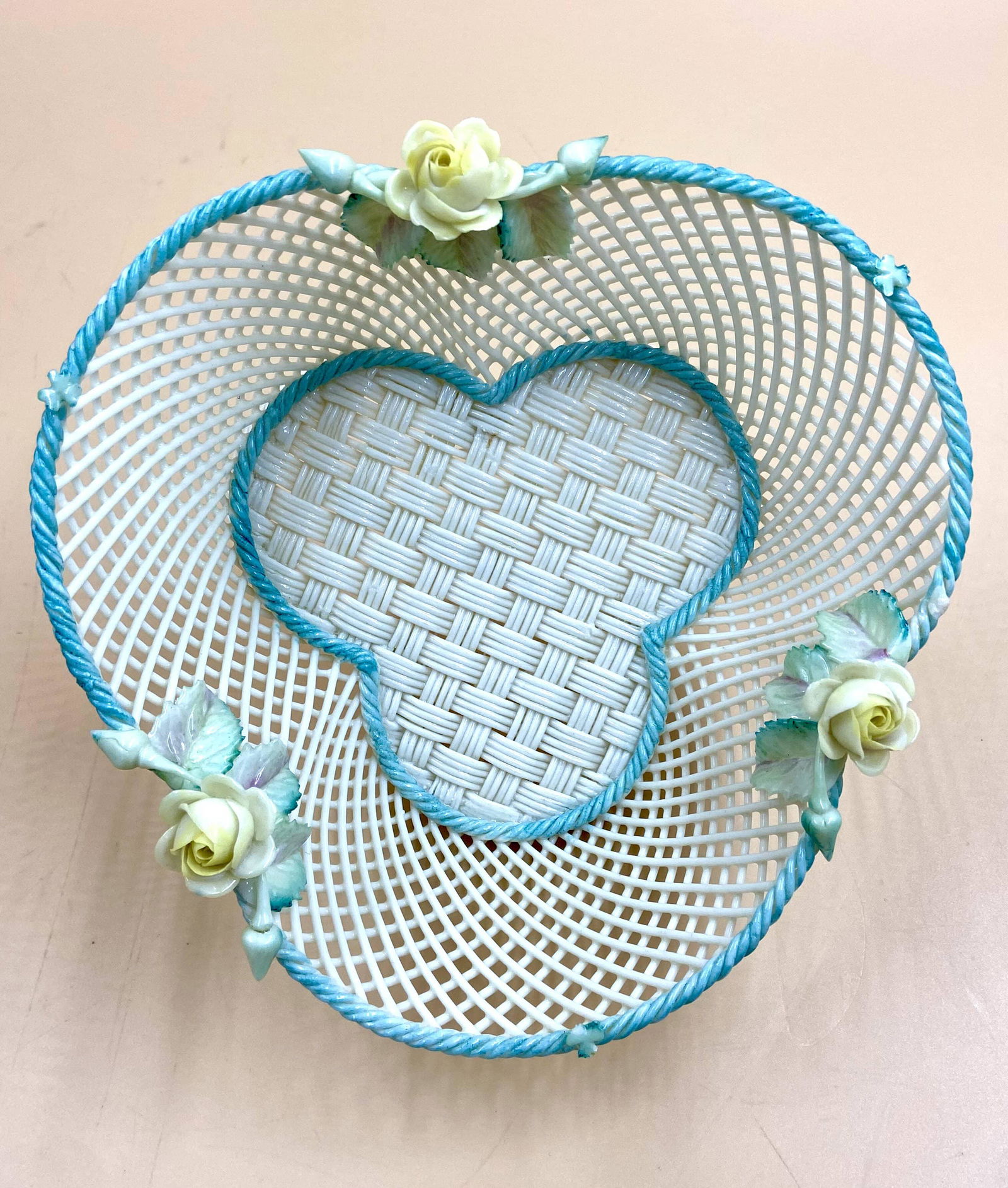 Vintage Belleek Shamrock Basket: Vintage Belleek Shamrock Basket Small Size 6 1/2' x 6 1/2" x 2 1/2". Shape Number D109-2 Base Banner With Markings Not Legible, Cross Hatchery Sides. Basket Weave Base And Blu Rope Edges. Missing One