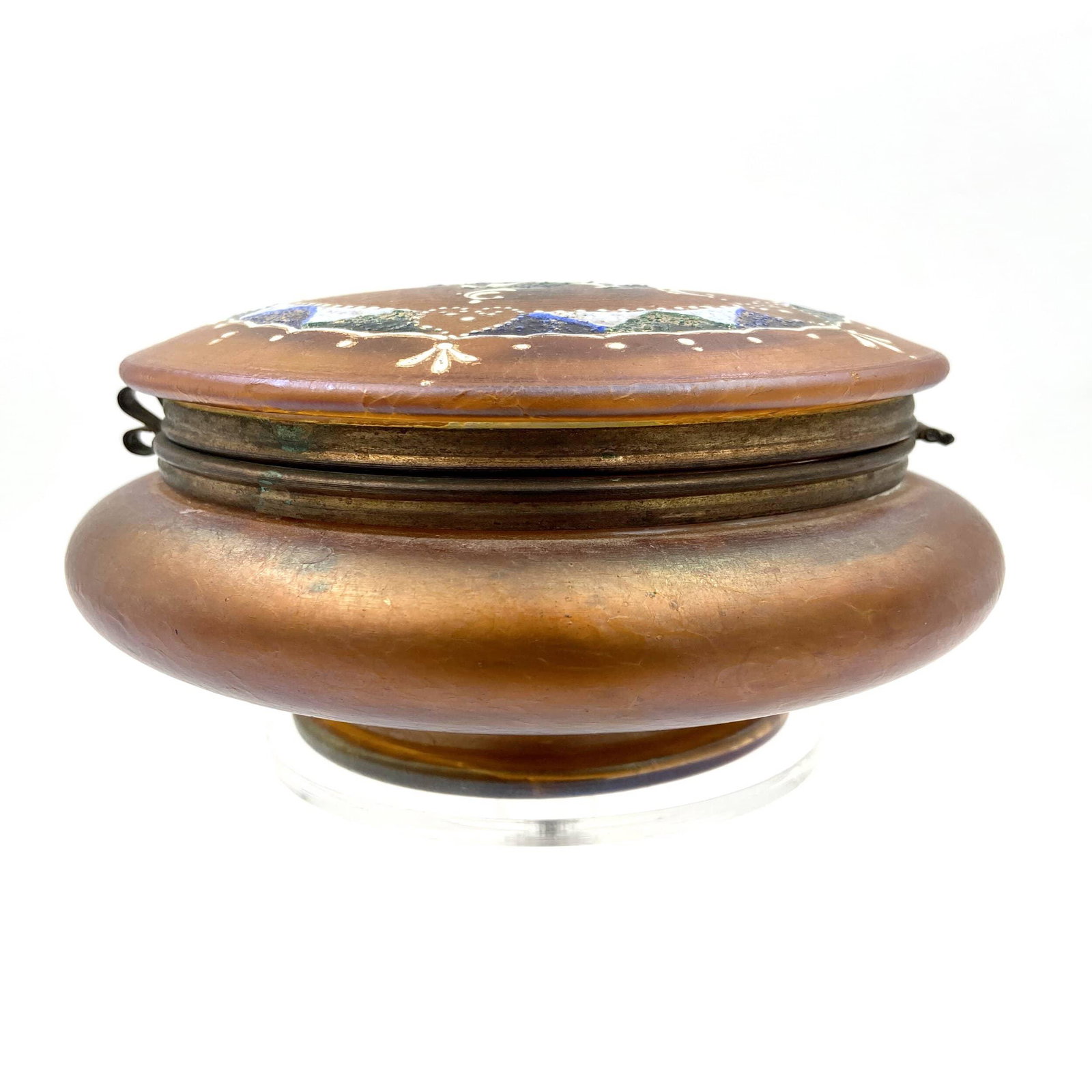 An Antique Loetz Style Iridescent Glass Casket: An Antique Loetz Style Iridescent Glass Casket.. measures 5" x 2 3/4" .. Please carefully read our terms of sale, shipping information, and request any condition reports or photos prior to placing a b