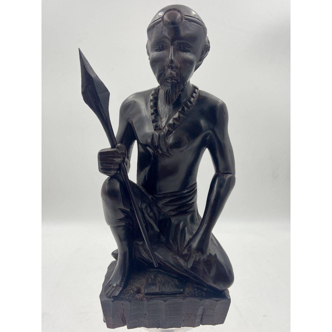 Vintage Pacific Islander Wood Carved Sculpture/Figure: Vintage Pacific Islander Wood Carved Sculpture/Figure. Measures 10" 4 1/4" x 3". Comes from a Central Florida Estate. Please carefully read our terms of sale, shipping information, and request any con