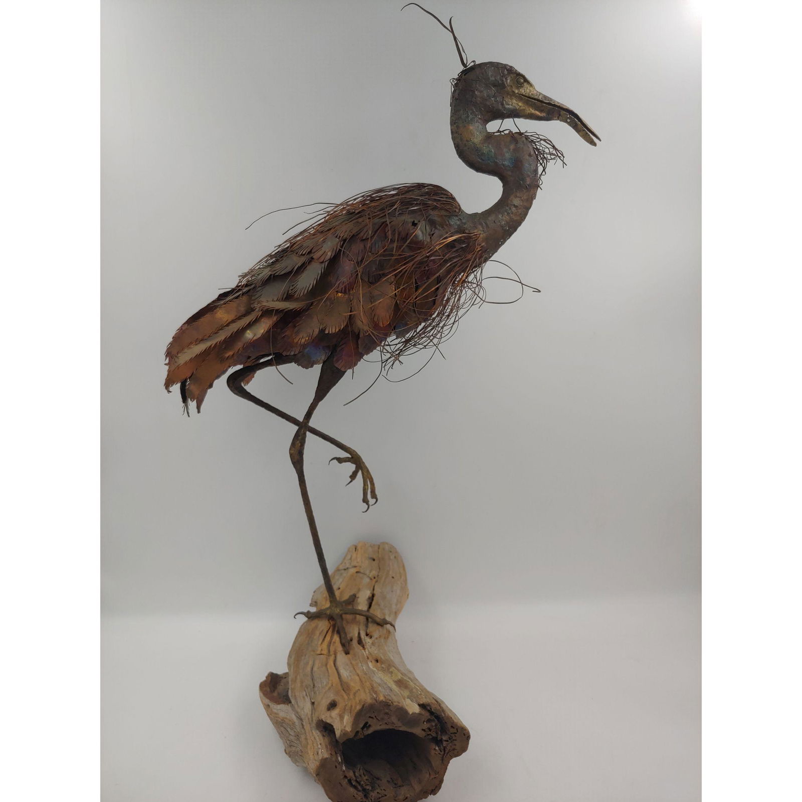 Bronze Metal Heron Standing on Log (1 of 10)