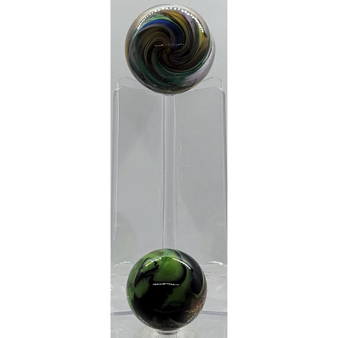 2 Vintage Marbles: 2 Vintage Marbles. Measure Approx. 1 & 3/4" Diameter. From A Mo Estate. Please carefully read our terms of sale, shipping information, and request any condition reports or photos prior to placing a bi