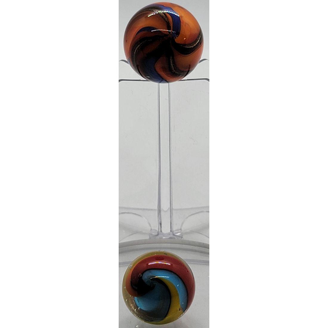 2 Vintage Marbles: 2 Vintage Marbles. Measure Approx. 1" & 3/4" Diameter. From A Mo Estate. Please carefully read our terms of sale, shipping information, and request any condition reports or photos prior to placing a b