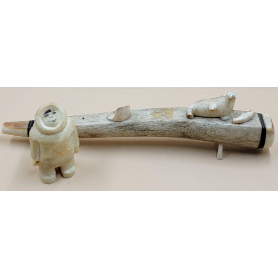 Lot Of 2 Inuit Whale Bone Carvings: Lot Of 2 Inuit Whale Bone Carvings. Measure 11 3/4" Long, Figure 3 1/4" Tall. This, and many lots forthcoming were found at the massive central Florida estate of a true antiquarian who amassed his mag