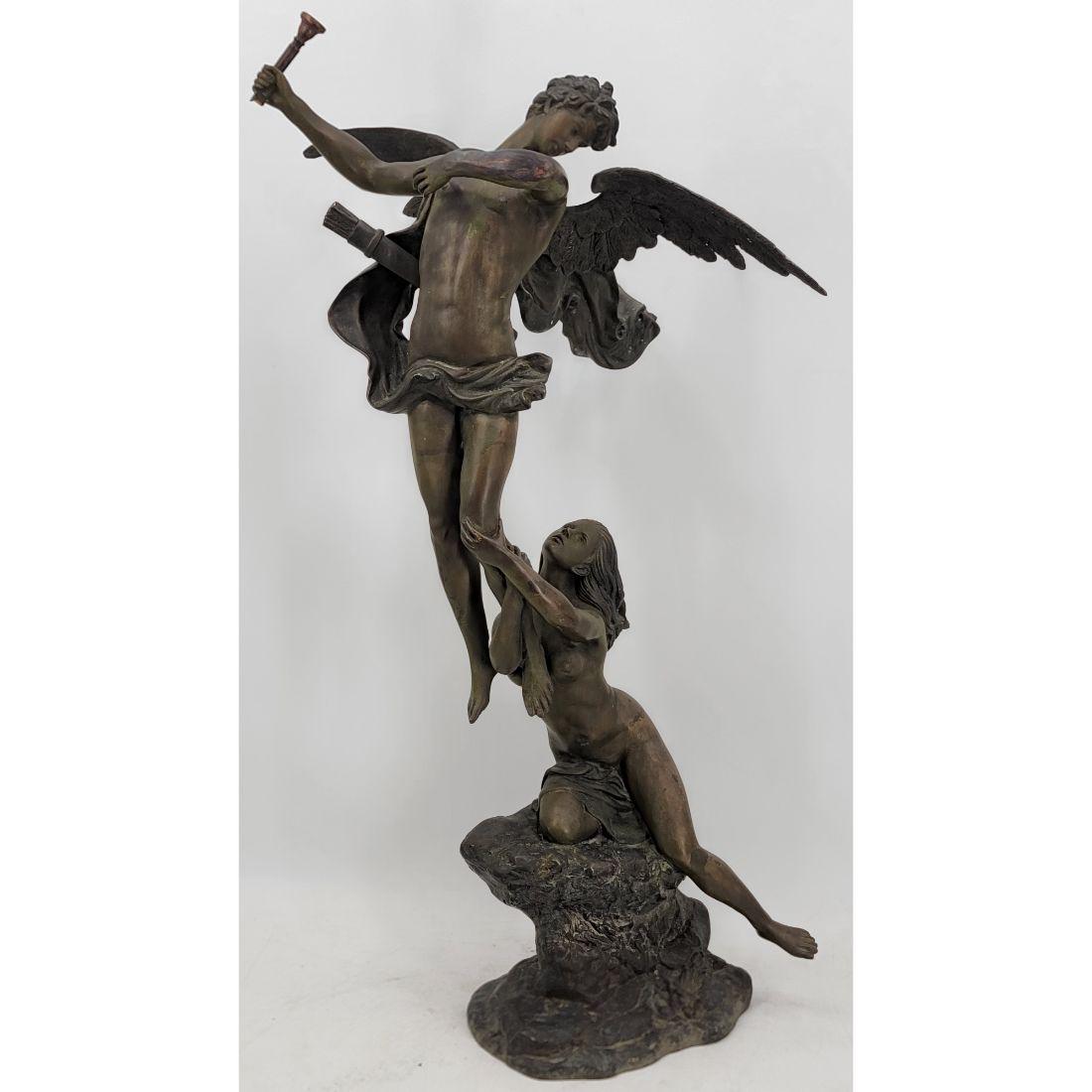 A Fine Signed Bronze Cupid And Nude Female Verdigris Statue: A Fine Signed Bronze Cupid Verdigris Statue (Missing The Bow). Measures 39" X 23.5" X 14". Please note: we attribute this work to based upon the quality and The presence of a signature. We are not an