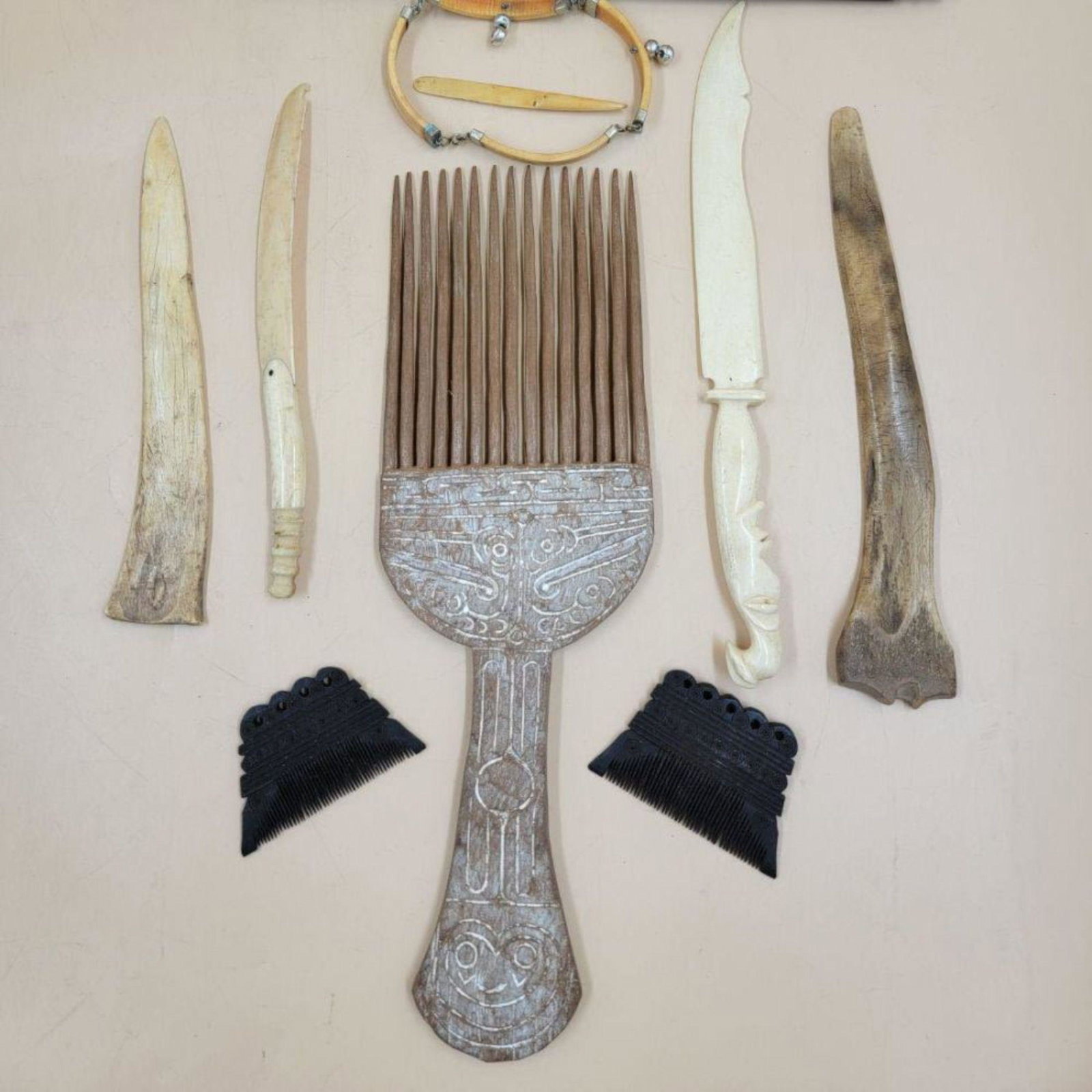 A Grouping Of Hand Carved African Tribal Comb Tools Necklace Etc.: A Grouping Of Hand Carved African Tribal Comb Tools Necklace Etc. Early 20th C, Various Sizes. This, and many lots forthcoming were found at the massive central Florida estate of a true antiquarian wh
