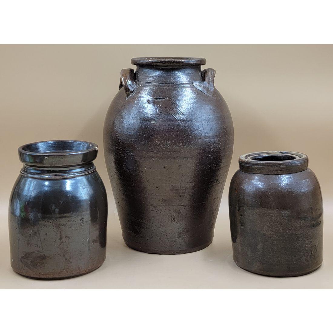Lot Of 3 Brown-Glazed Stoneware Crocks: Lot Of 3 Brown-Glazed Stoneware Crocks. Measures from 6 3/4" - 13" tall. FROM THE ESTATE OF THE LATE ROBERT RUEBSAMEN. Please carefully read our terms of sale, shipping information, and request any co