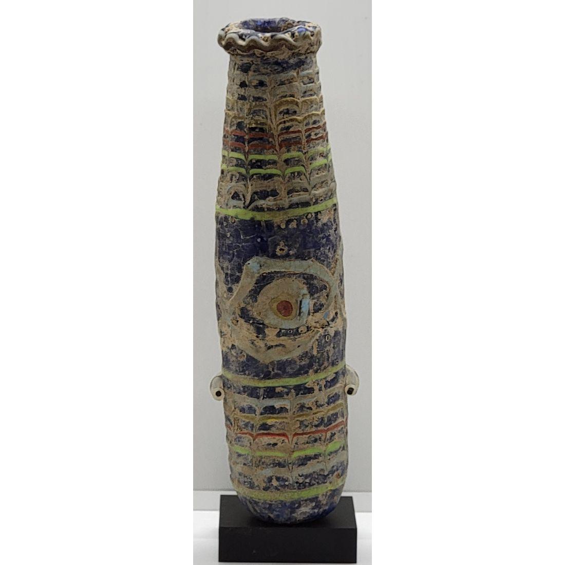 Super Rare Phoenician Mosaic Glass Bottle From The Mediterranean 1500-300 BC: Super Rare Phoenician Mosaic Glass Bottle From The Mediterranean 1500-300 BC (STAND NOT INCLUDED). Measures 5 1/2" tall. FROM A OHIO ESTATE. Please carefully read our terms of sale, shipping informati
