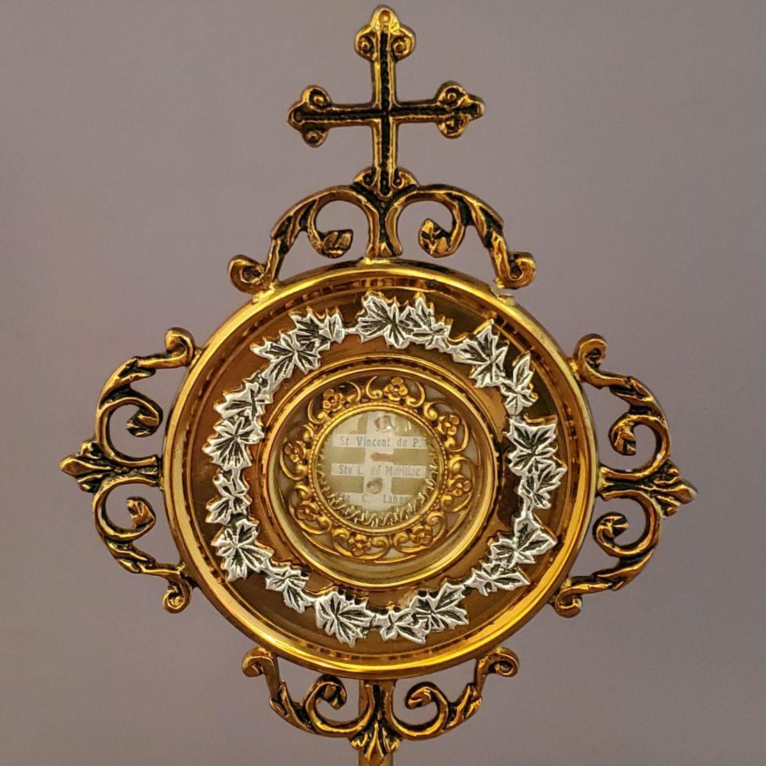 3- 1st Class Relics, St Vincent DePaul, St Catherine Labourne & Saint Louise De Marillac: 3- 1st Class Relics, St Vincent DePaul, St Catherine Labourne & Saint Louise De Marillac. Ornate theca containing the 3 religious catholic relics of these saints. The theca is in a very nice silver an