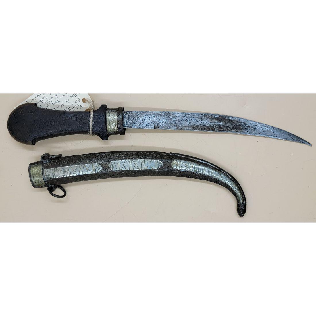 A Moroccan Koummya, Circa 1900, Moroccan Silver-Mounted Dagger Jambiya: (IMPORTANT, PLEASE READ CARDS DEPICTED IN PHOTOS, WE ARE SELLING AS AGES UNKNOWN SO PLEASE MAKE YOUR OWN DETERMINATIONS AND DECISIONS BEFORE YOU BID) A Moroccan Koummya, Circa 1900, Moroccan Silver-Mo